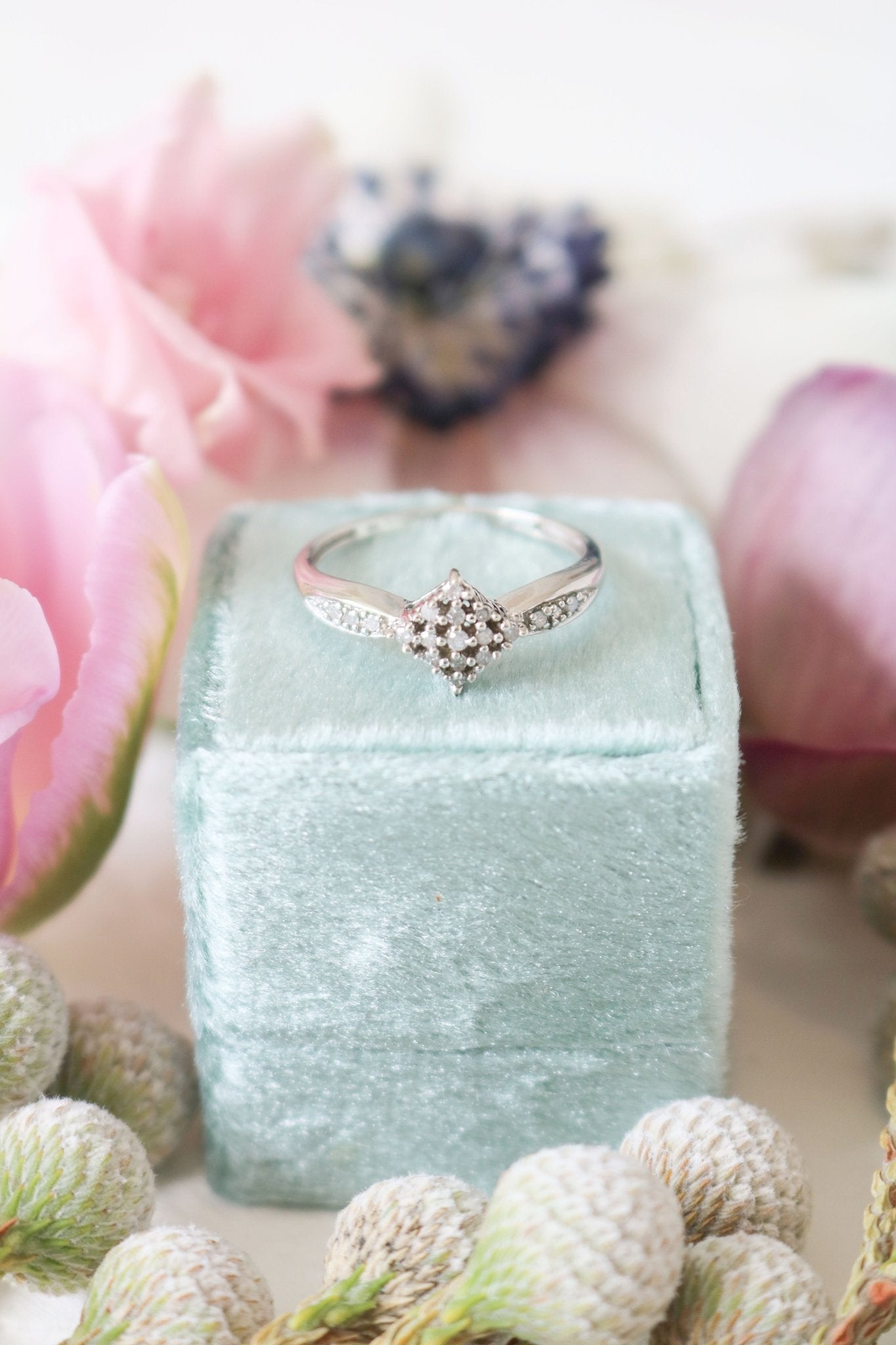 9ct White gold engagement ring with diamond inlay atop a ring box. Antique Engagement Rings Canada. Canadian vintage engagement rings. Vintage engagement rings Canada. Bridal jewelry Canada.