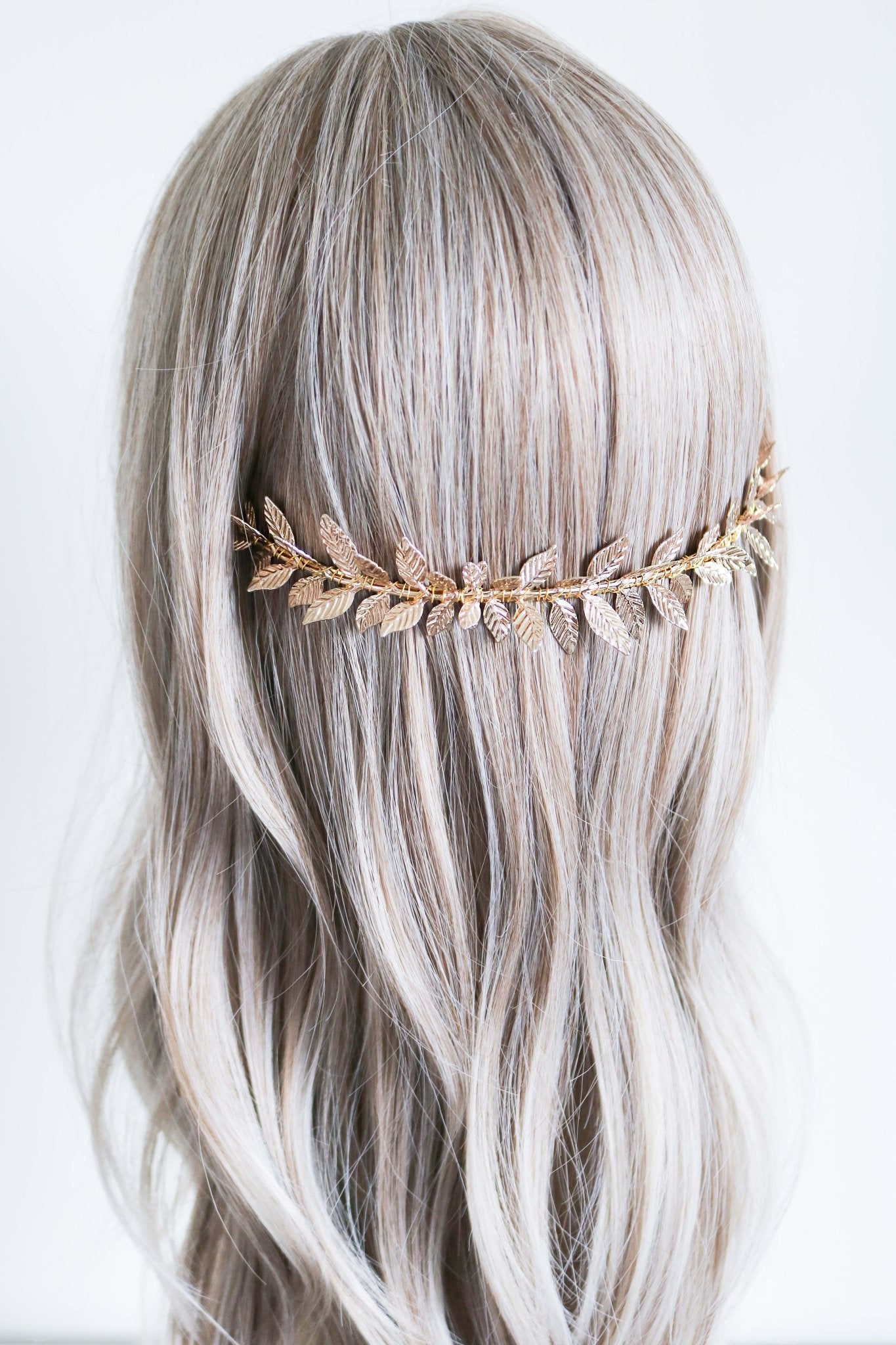 Wedding headband with gold dipped laurel leaves set against wavy locks. Bridal Hair Accessories. Bridal Accessories. Canadian Bridal Accessories. Handmade Canadian Accessories. Canadian handmade Accessories. Canadian weddings. Wedding Canada. Canadian designer. Canadian artist.