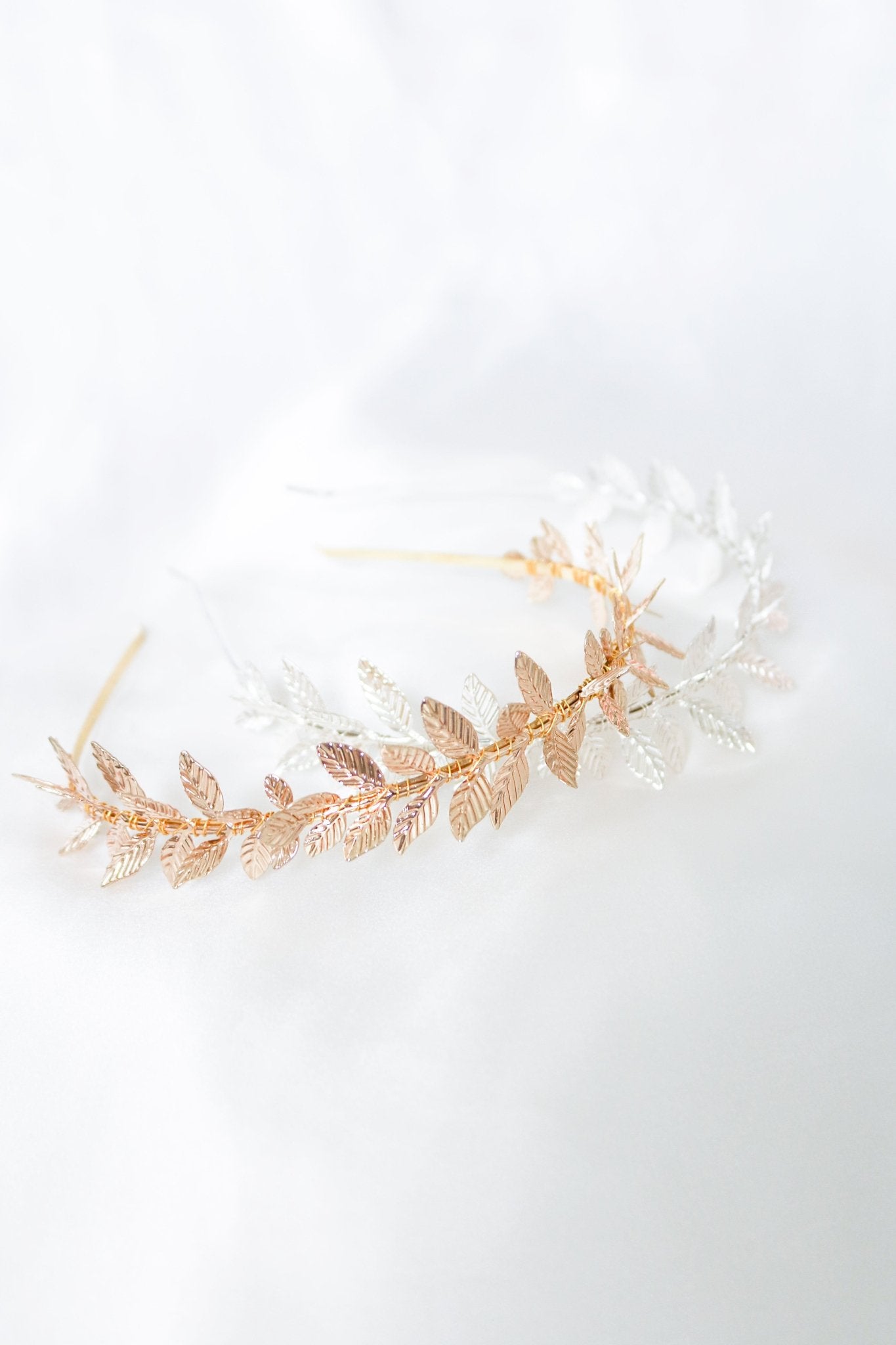 Adolenda Leaf Headband in Silver and Gold Options displayed against a soft white background. Bridal Hair Accessories. Bridal Accessories. Canadian Bridal Accessories. Handmade Canadian Accessories. Canadian handmade Accessories. Canadian weddings. Wedding Canada. Canadian designer. Canadian artist.