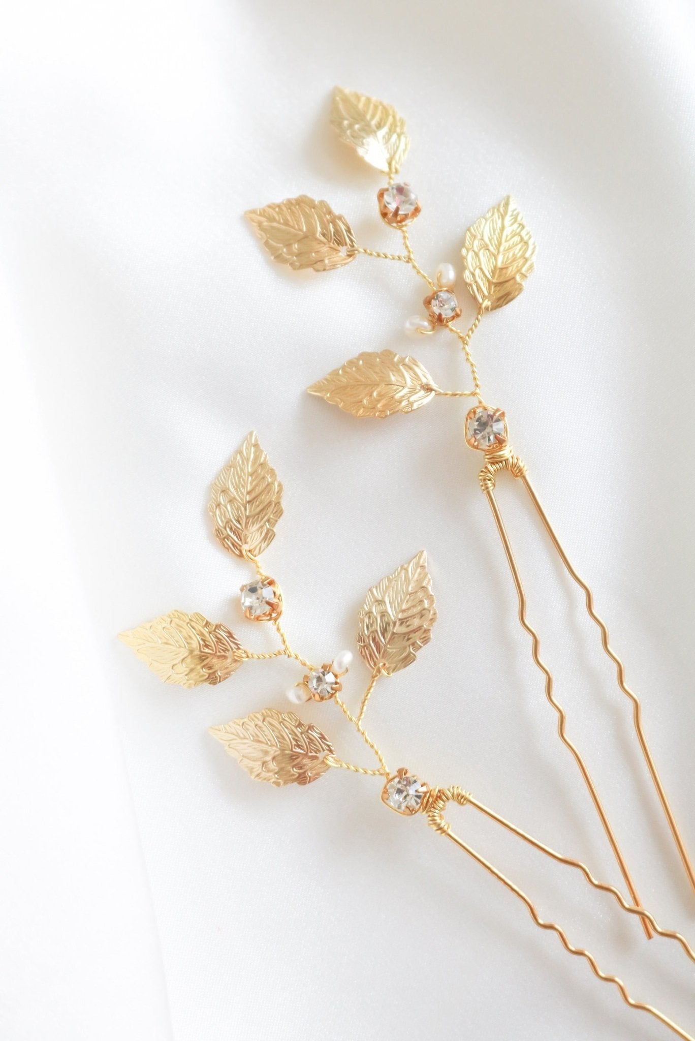 Aelia Leaf and Crystal Fresh Water Pearl Hairpins in gold. Bridal Hair Accessories. Bridal Accessories. Canadian Bridal Accessories. Handmade Canadian Accessories. Canadian handmade Accessories. Canadian weddings. Wedding Canada. Organic pearl accessories. Pearl Bridal Hair Accessories. Pearl Bridal Accessories.