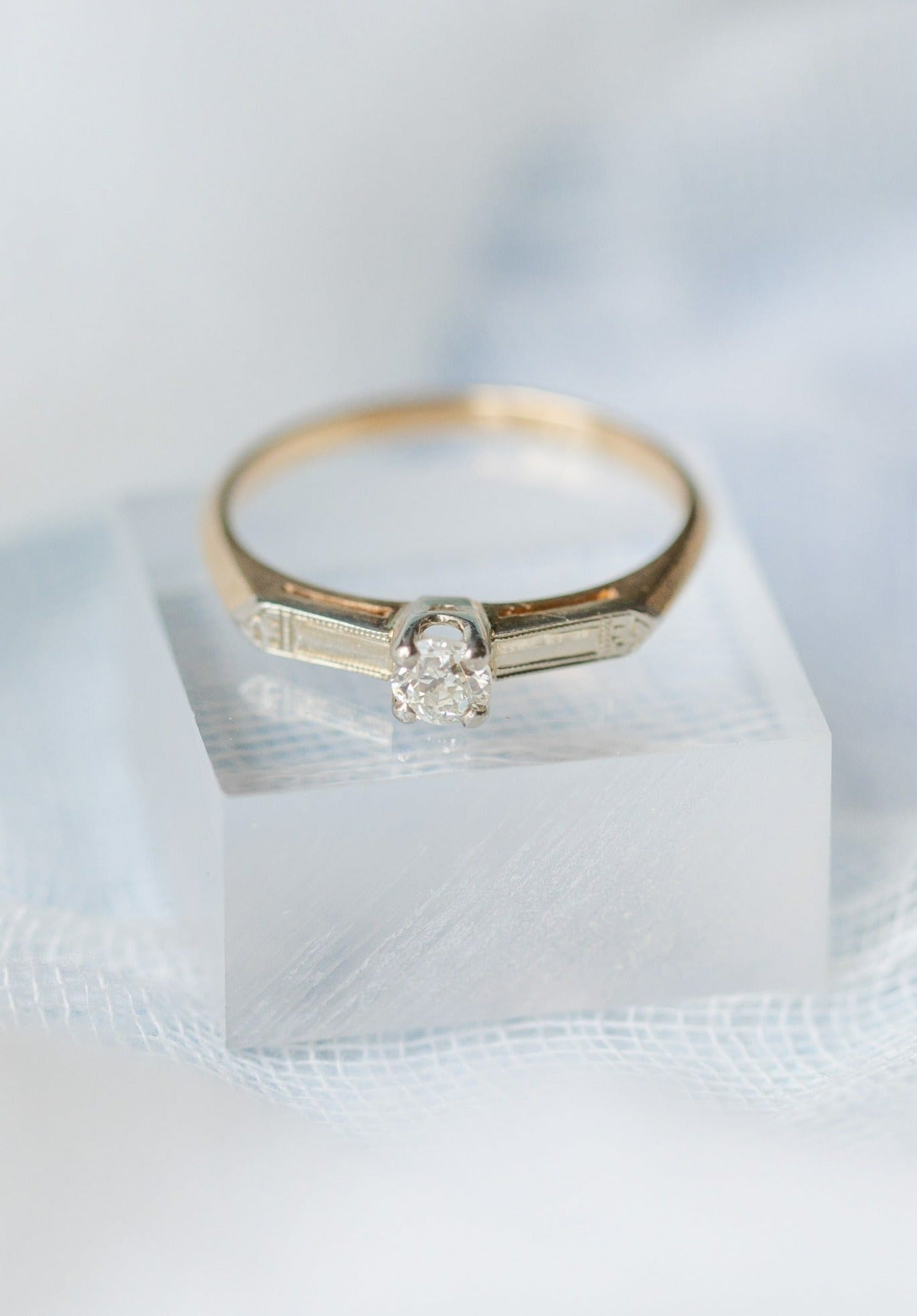 Art Deco Solitaire Diamond Engagement Ring in 14k Yellow and White Gold. Antique Engagement Rings Canada. Canadian vintage engagement rings. Vintage engagement rings Canada. Bridal jewelry Canada. Canadian weddings. Wedding Canada. Canadian bridal jewelry. Woman-owned Canadian jewelry brand. Canadian jewelry business.