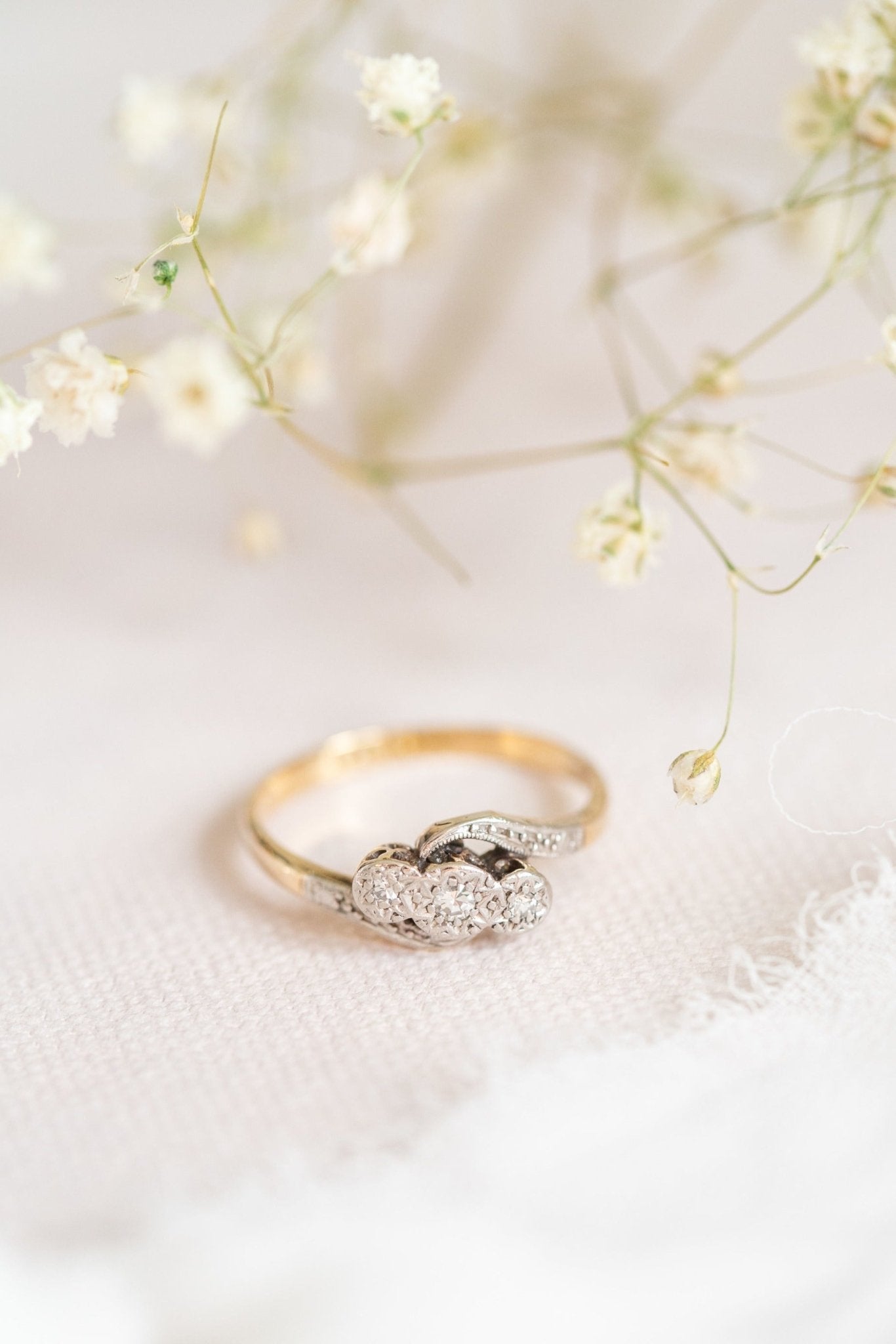 A Vintage Trilogy Diamond Engagement Ring with 18k Gold and Platinum. Antique Engagement Rings Canada. Canadian vintage engagement rings. Vintage engagement rings Canada. Bridal jewelry Canada. Canadian weddings. Wedding Canada. Canadian jewelry brands. Affordable Canadian jewelry brands. Canadian bridal jewelry. Woman-owned Canadian jewelry brand. Canadian jewelry business.