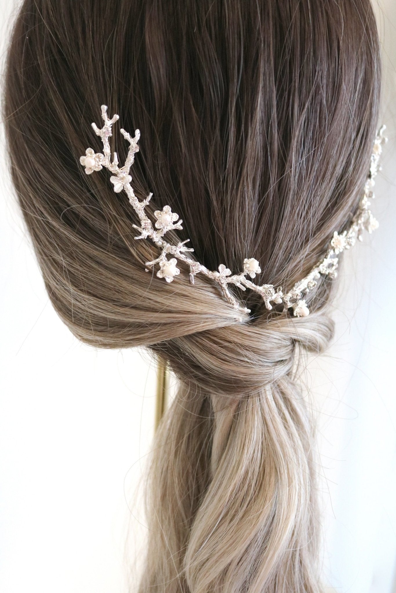 Floral branch hair comb with pearl flowers for bridal jewelry set in ponytail. Bridal Hair Accessories. Bridal Accessories. Canadian Bridal Accessories. Handmade Canadian Accessories. Canadian handmade Accessories. Canadian weddings. Wedding Canada. Organic pearl accessories. Pearl Bridal Hair Accessories. Pearl Bridal Accessories.