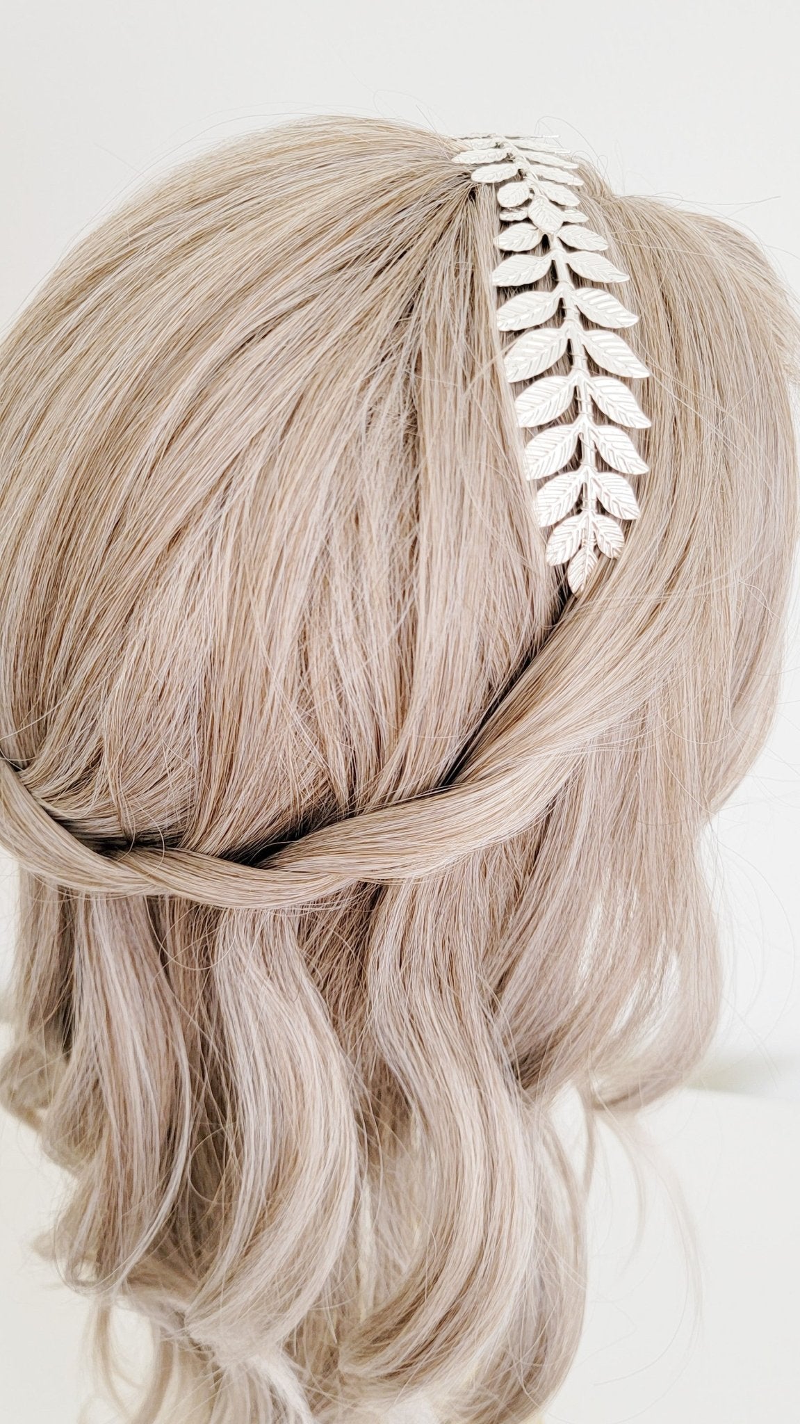 Silver wire-wrapped laurel leaf bridal headband in bridal hair. Bridal Hair Accessories. Bridal Accessories. Canadian Bridal Accessories. Handmade Canadian Accessories. Canadian handmade Accessories. Canadian weddings. Wedding Canada.