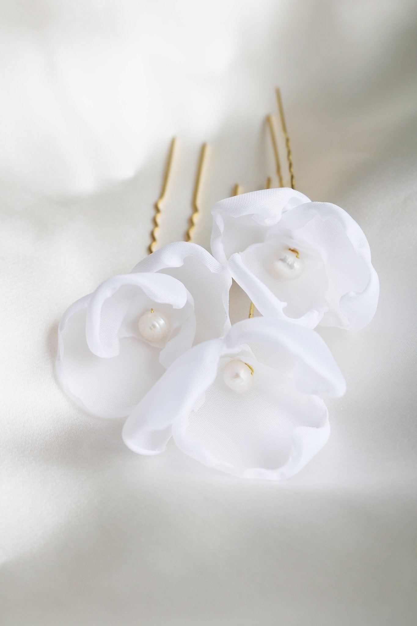 Three Averie Floral Hairpins with Freshwater Pearls and Fabric Flowers. Canadian bridal jewelry
Woman-owned Canadian jewelry brand. Canadian jewelry business. 
Organic pearl jewelry. Bridal jewelry Canada. Pearl jewelry Canada. Pearl Bridal jewelry Canada.