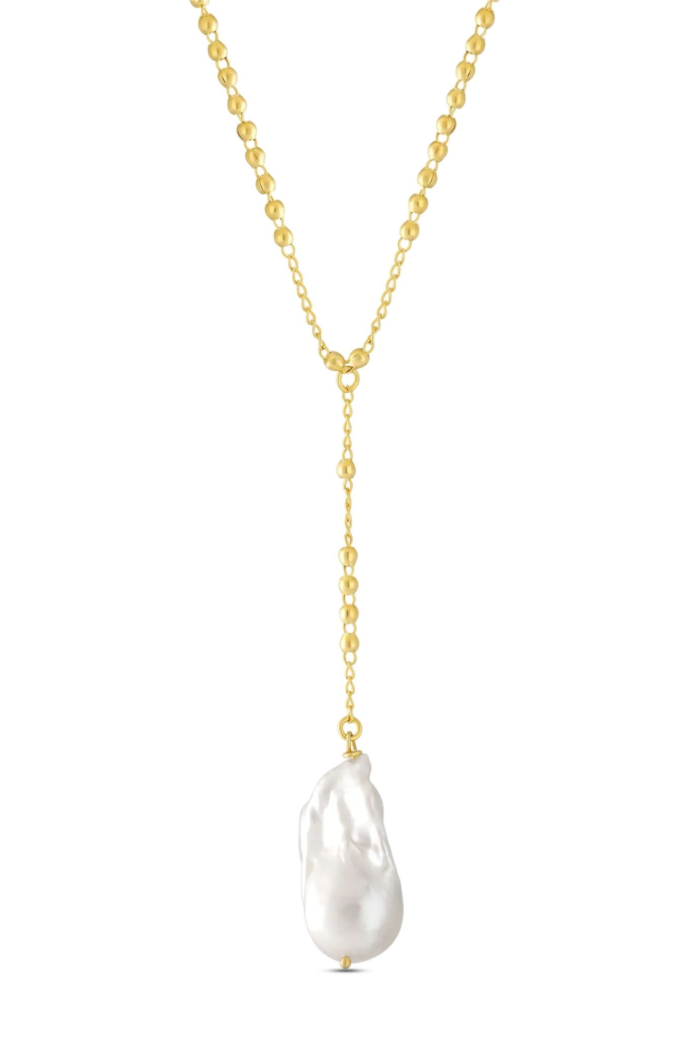 An 18k gold-filled beaded lariat style necklace with large freshwater baroque pearl on white background. Pearl jewelry Canada. Gold-filled jewelry. Handmade Canadian jewelry.