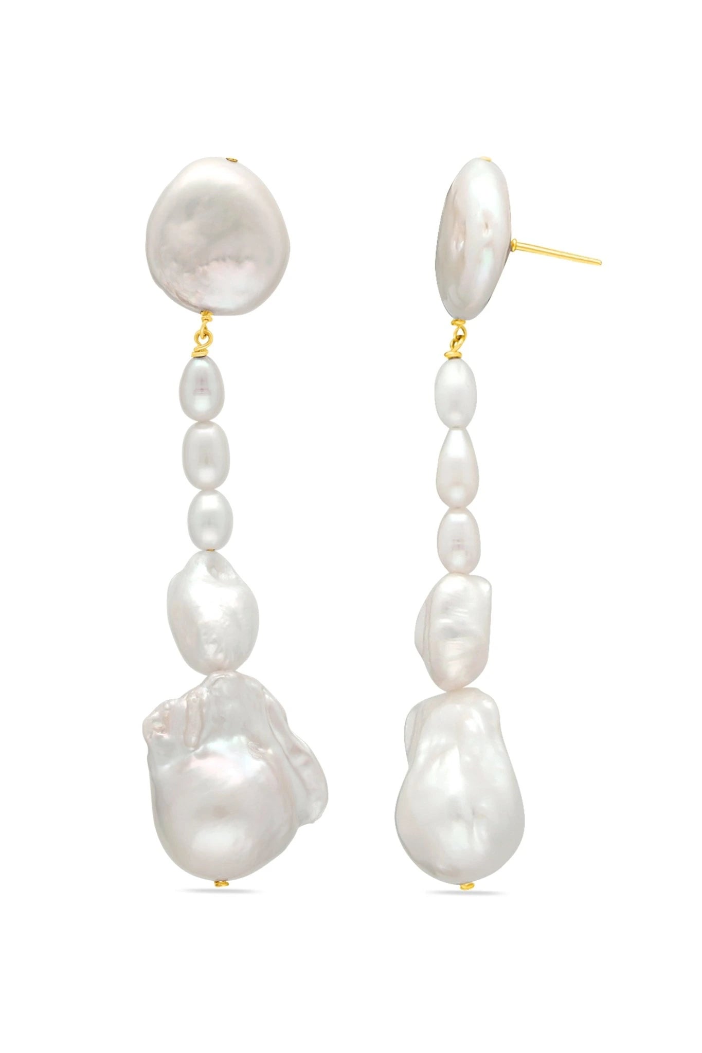 A pair of long drop bridal earrings featuring genuine Baroque & organic freshwater pearls with gold-filled or sterling silver hardware. Pearl Bridal jewelry for Canadian weddings. Statement pearl bridal earrings & organic pearl jewelry handmade by a Woman-owned Canadian jewelry brand