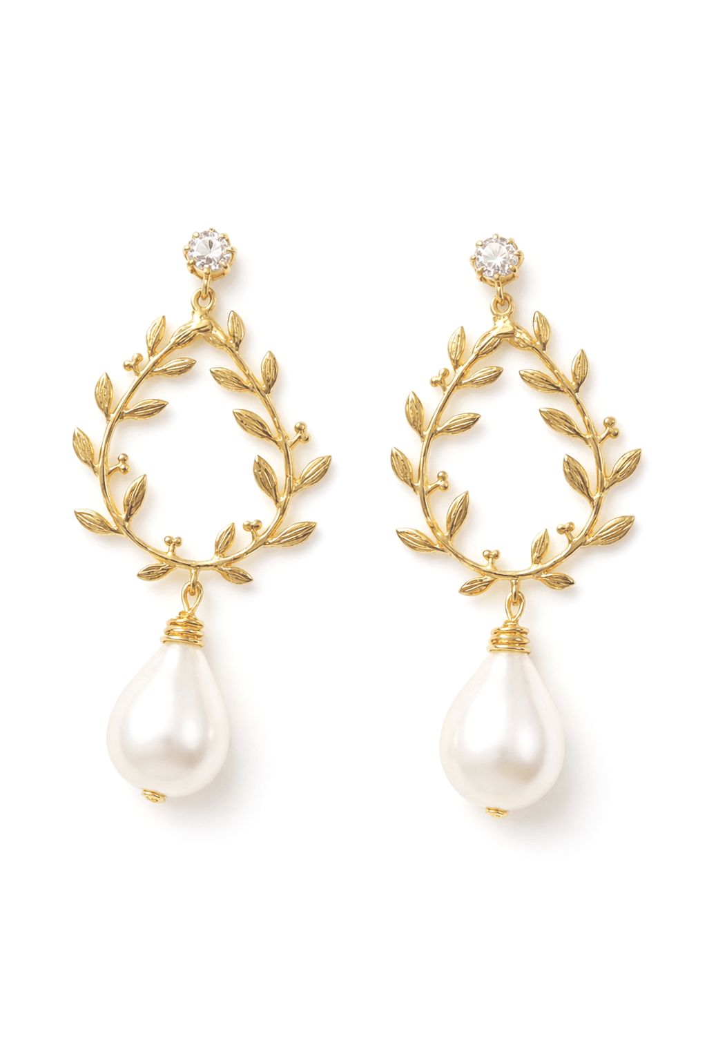 Gold-filled bridal laurel leaf earrings with freshwater pearl drops on a white background. Gold-filled jewelry, statement bridal earrings, & handmade Canadian jewelry by Canadian jewelry designer