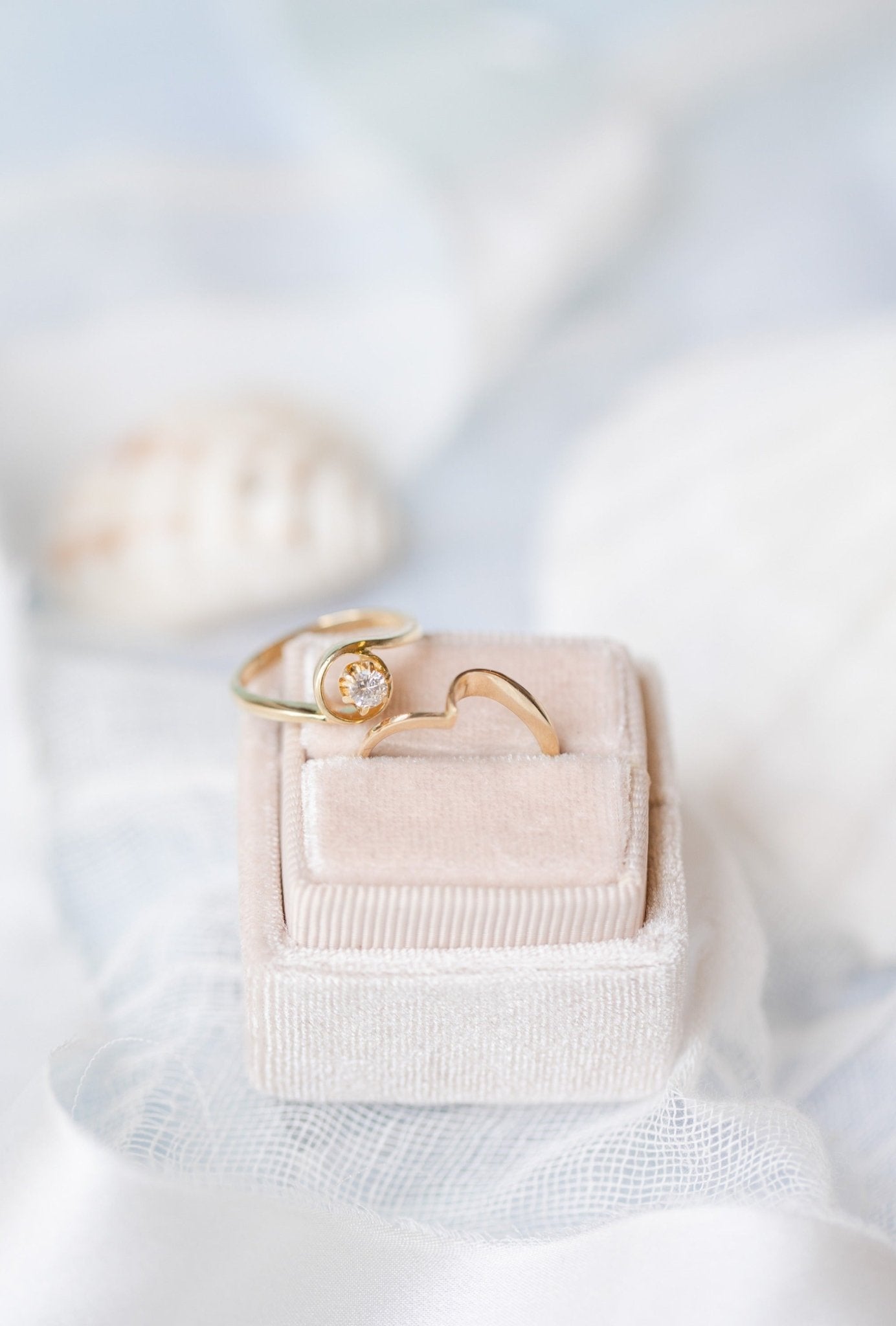 The Clara Vintage Solitaire Diamond Engagement Ring Set in 14k Gold sit together in and on a ring box. Antique Engagement Rings Canada. Canadian vintage engagement rings. Vintage engagement rings Canada. Bridal jewelry Canada. Canadian weddings. Wedding Canada. Canadian bridal jewelry. Woman-owned Canadian jewelry brand. Canadian jewelry business.