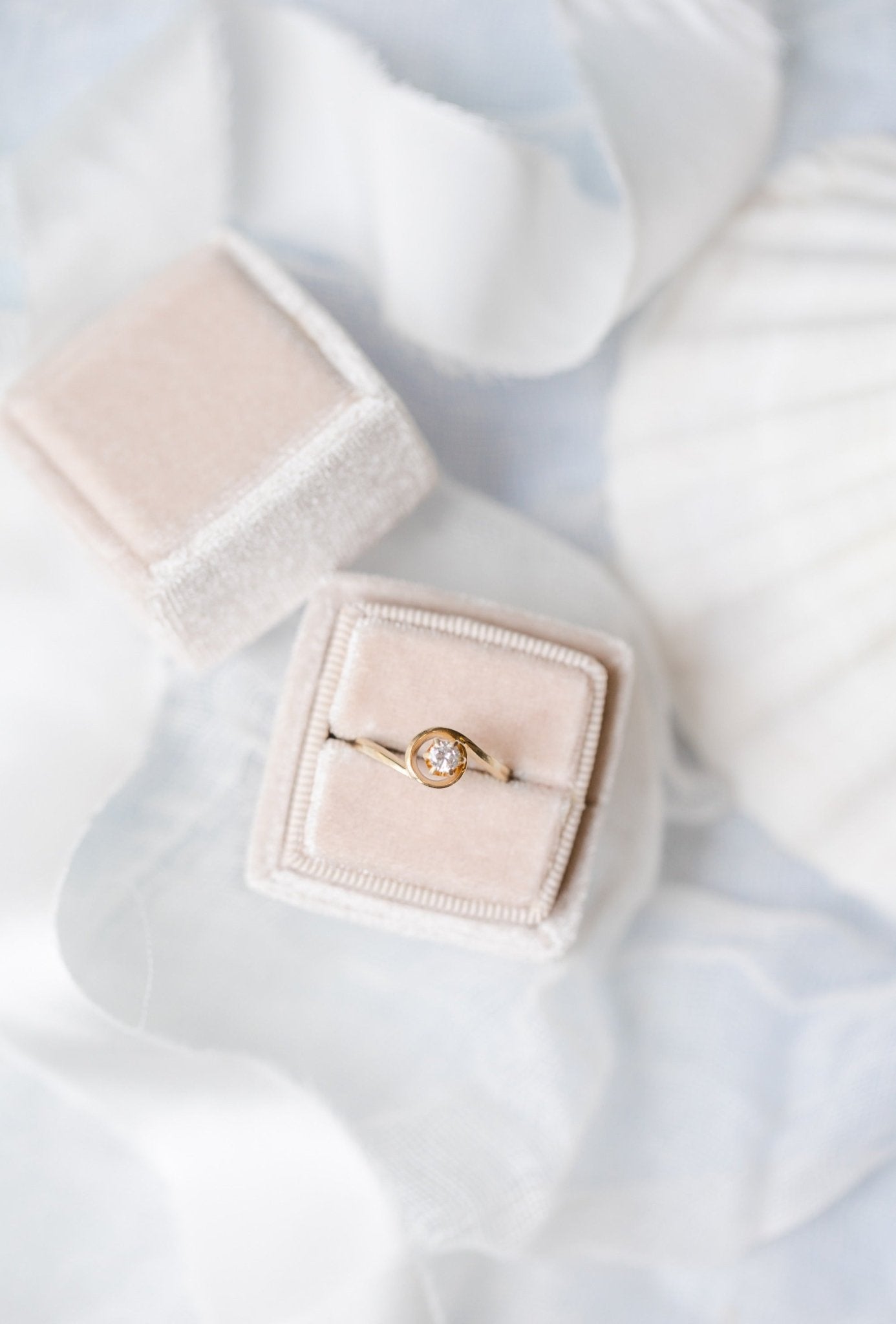 A view from above a 14k Gold Diamond Vintage Engagement Ring sitting in a ring box on a white backdrop. Antique Engagement Rings Canada. Canadian vintage engagement rings. Vintage engagement rings Canada. Bridal jewelry Canada. Canadian weddings. Wedding Canada. Canadian bridal jewelry. Woman-owned Canadian jewelry brand. Canadian jewelry business.