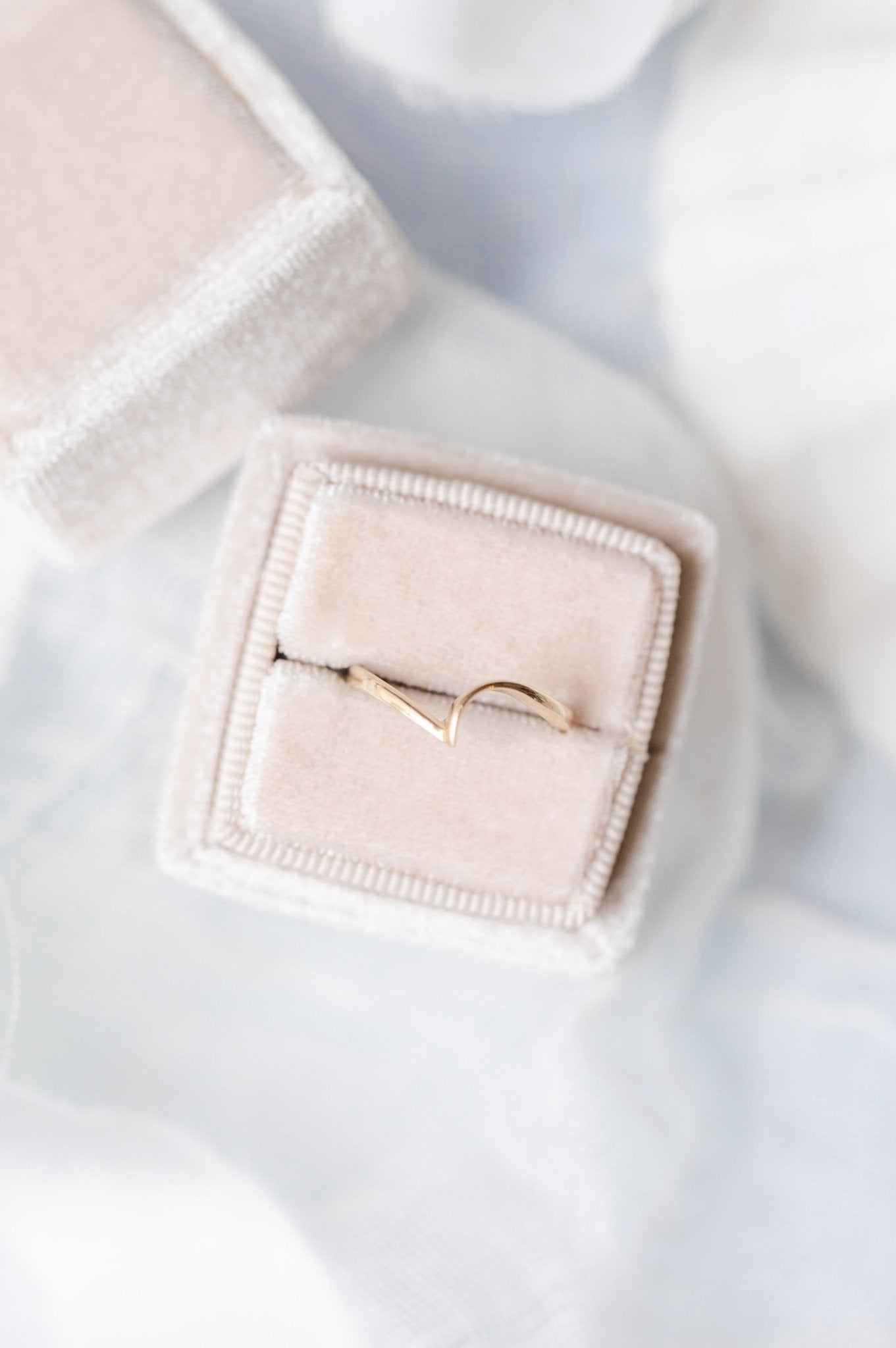 Top view of a 14k Gold matching Wedding Ring Band sitting in a ring box against a white backdrop. Antique Engagement Rings Canada. Canadian vintage engagement rings. Vintage engagement rings Canada. Bridal jewelry Canada. Canadian weddings. Wedding Canada. Canadian bridal jewelry. Woman-owned Canadian jewelry brand. Canadian jewelry business.