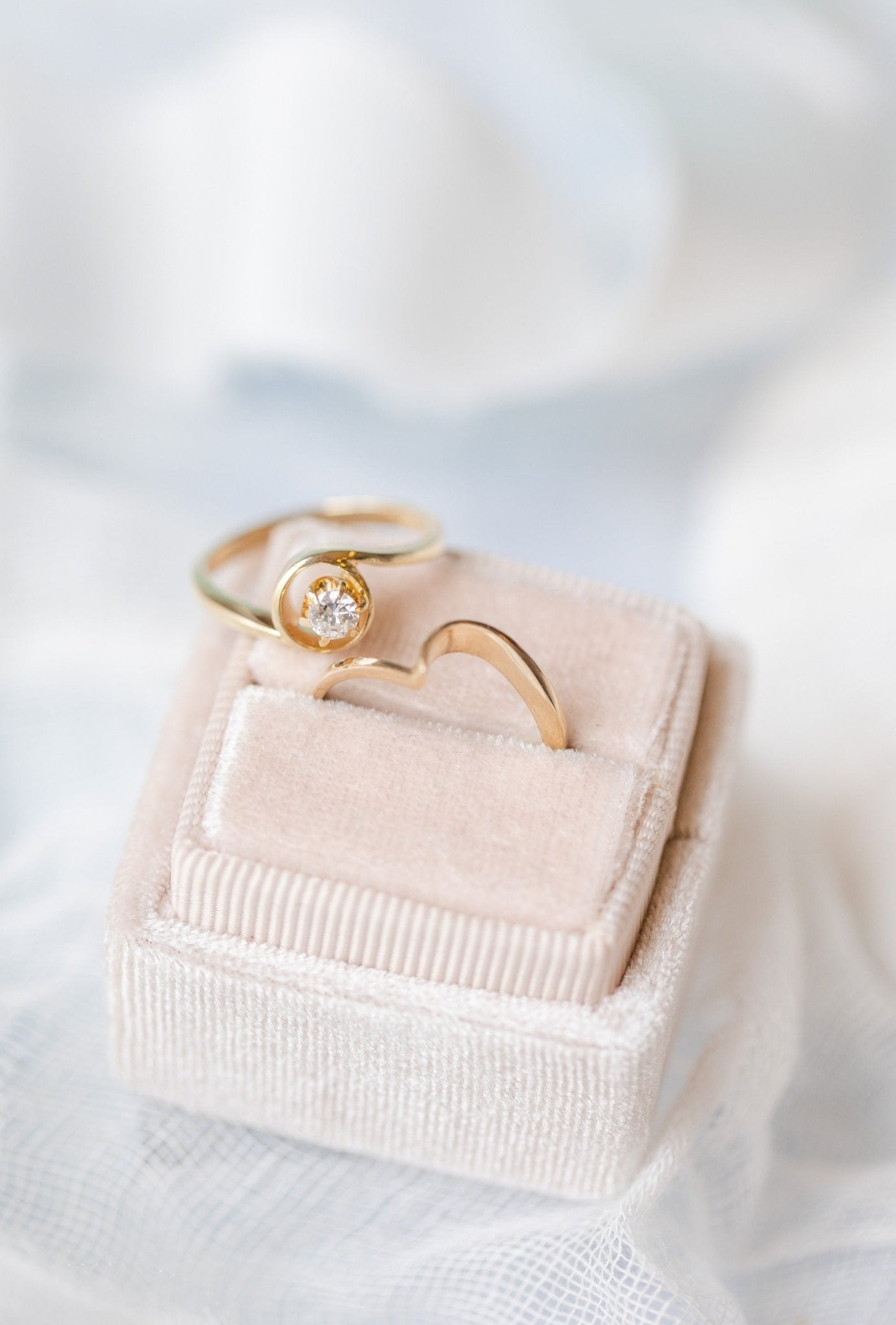 The Clara Vintage Solitaire Diamond Engagement Ring Set in 14k Gold sit together in and on a ring box. Antique Engagement Rings Canada. Canadian vintage engagement rings. Vintage engagement rings Canada. Bridal jewelry Canada. Canadian weddings. Wedding Canada. Canadian bridal jewelry. Woman-owned Canadian jewelry brand. Canadian jewelry business.