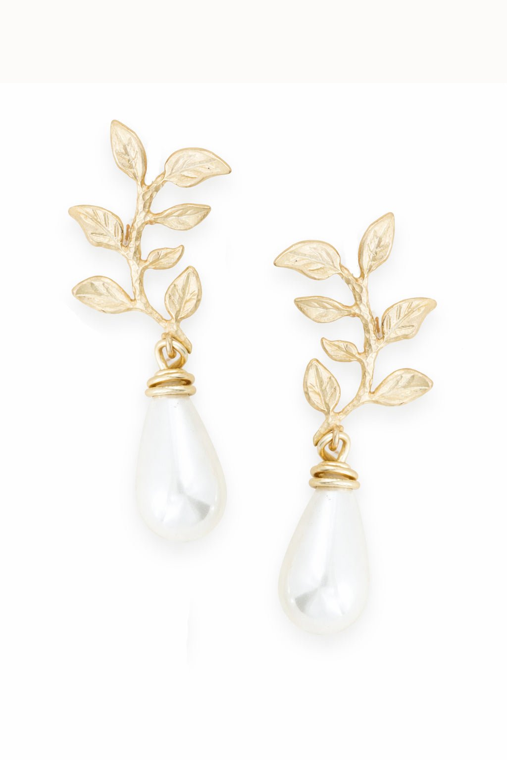Gold filled leaf bridal earrings with white teardrop-shaped fresh water pearls on a white background. Canadian bridal jewelry, statement bridal earrings, & pearl bridal jewelry handmade by small Canadian jewelry brand