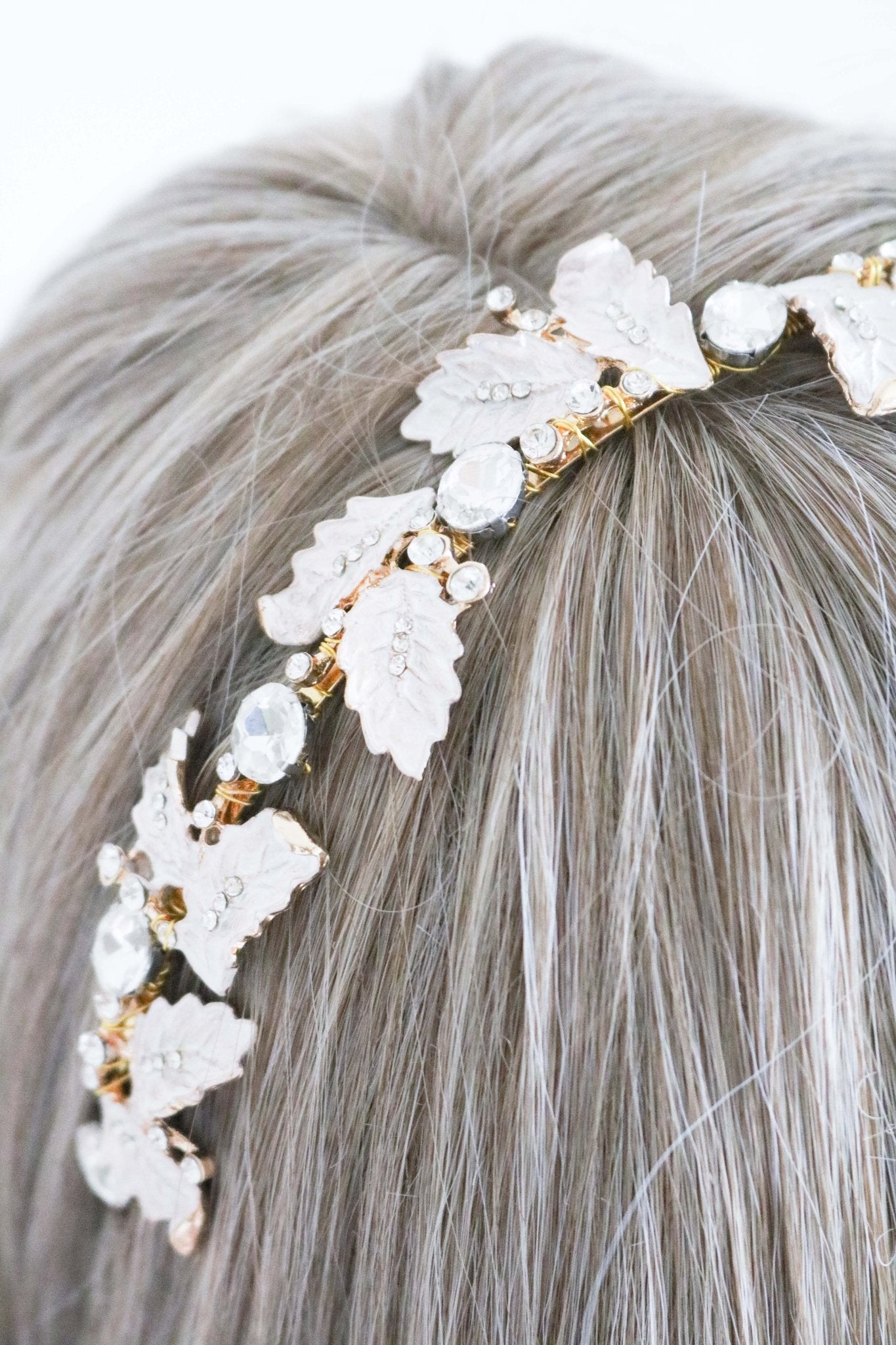 Close Up of Golden Dana Leaf and Crystal Headband. Bridal Hair Accessories. Bridal Accessories. Canadian Bridal Accessories. Handmade Canadian Accessories. Canadian handmade Accessories. Canadian weddings. Wedding Canada. Canadian designer. Canadian artist.