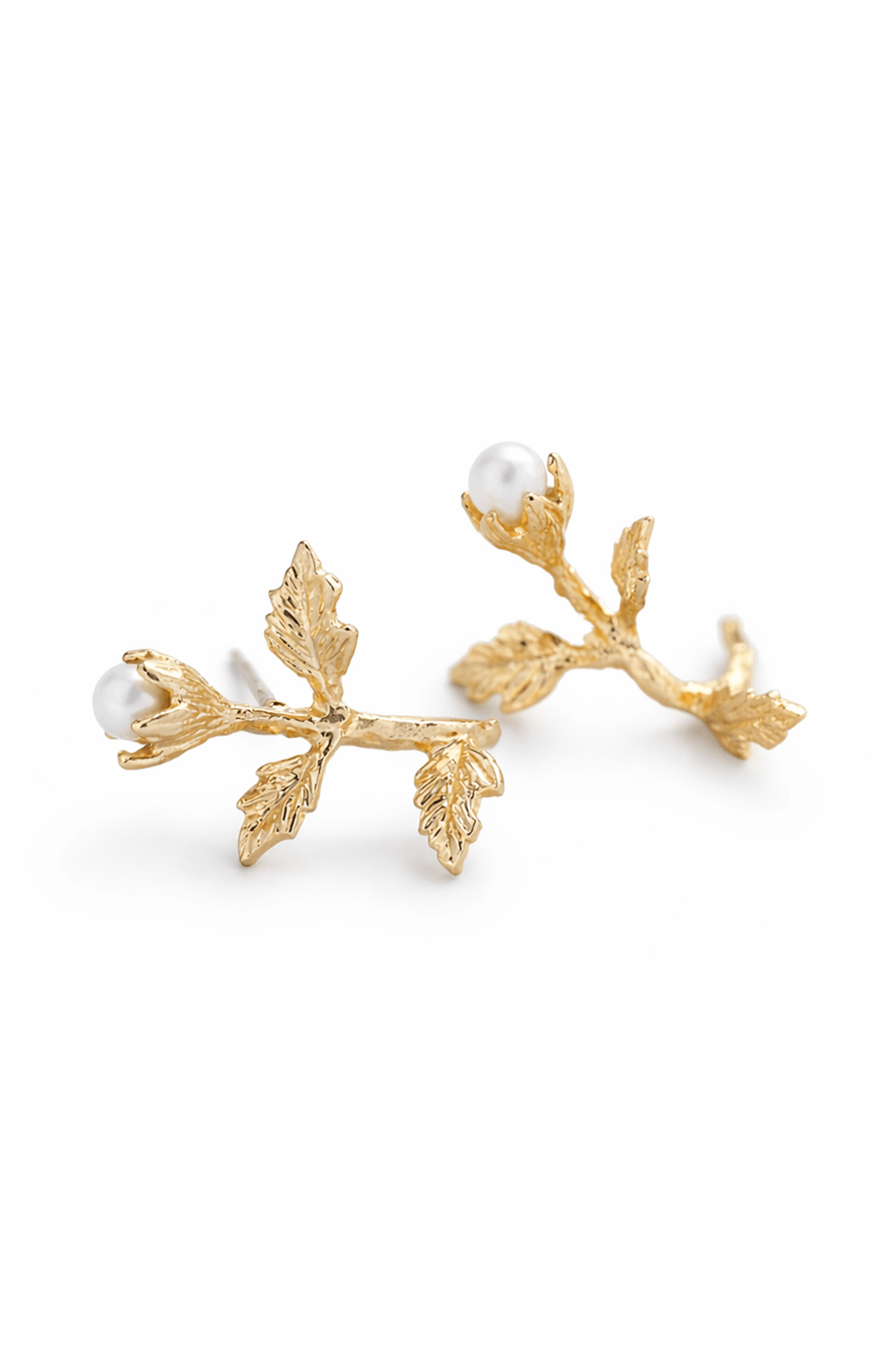 Gold-filled leaf-shaped earrings with freshwater pearls on a white background. Bridesmaid earrings & pearl jewelry made in Canada by small Canadian jewelry brand