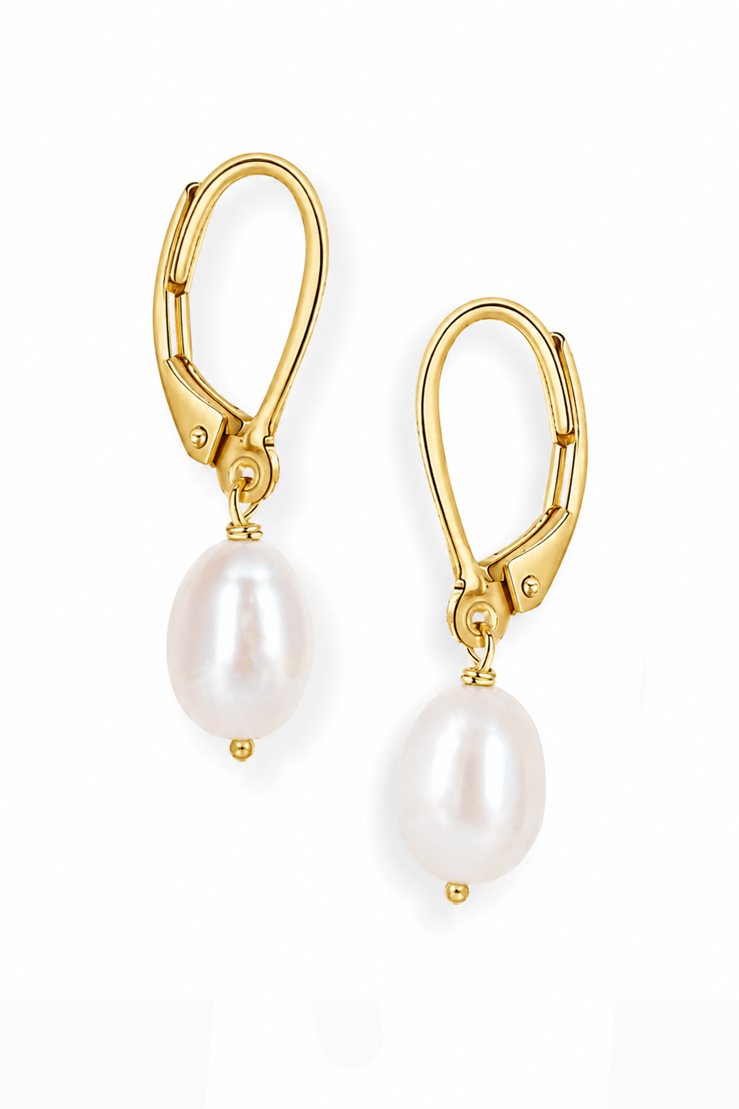 Handmade gold filled earrings with white fresh water pearls on a white background by Canadian Jewellery designer.