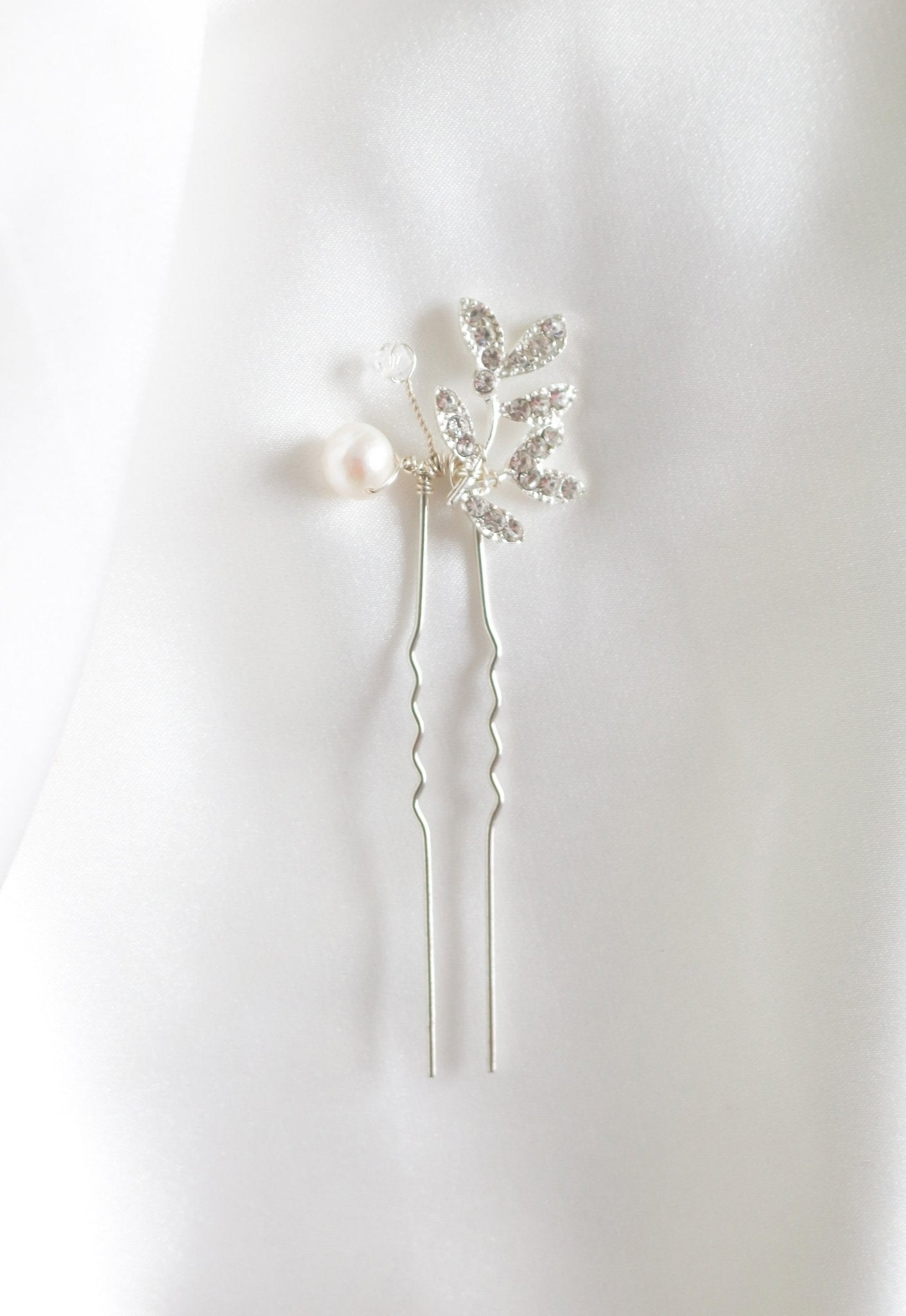 Silver Crystal Leaf and Pearl Hairpin for bridal. Organic pearl accessories. Pearl Bridal Hair Accessories. Pearl Bridal Accessories. Bridal Hair Accessories. Bridal Accessories. Canadian Bridal Accessories. Handmade Canadian Accessories. Canadian handmade Accessories. Canadian weddings. Wedding Canada.