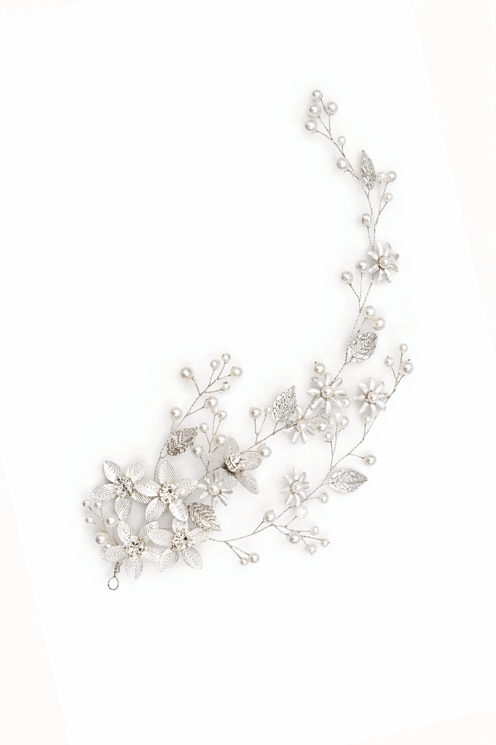 Delicate silver floral hair vine with pearls on a white background, wedding bridal hairpiece