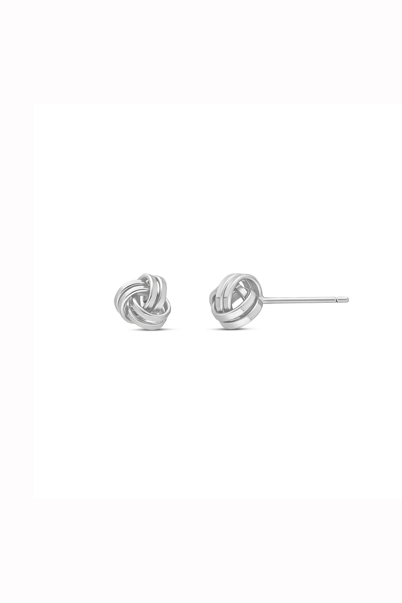 Pair of sterling silver earrings on a white background. Sterling Silver jewelry Canada. Minimalist Jewelry. Everyday jewelry. Woman-owned business.