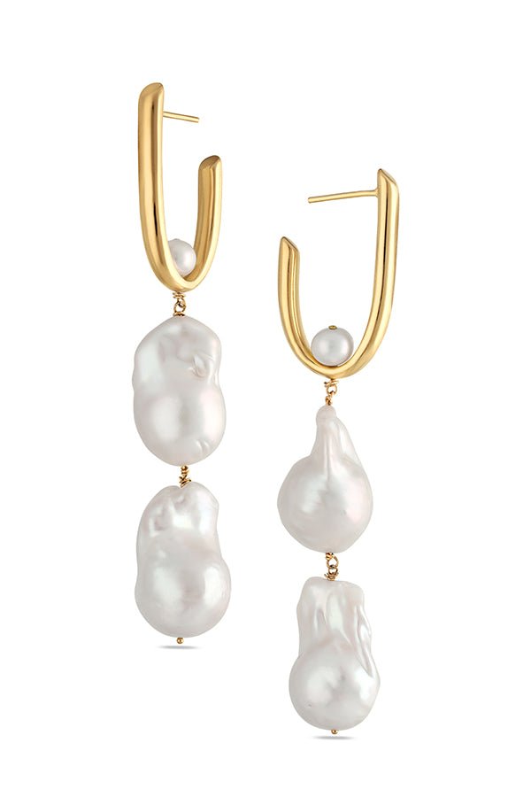 A pair of large gold-filled freshwater double baroque pearl earrings on white background. Statement bridal earrings, statement earrings, & pearl bridal earrings handmade in Canada by Canadian jewelry designer