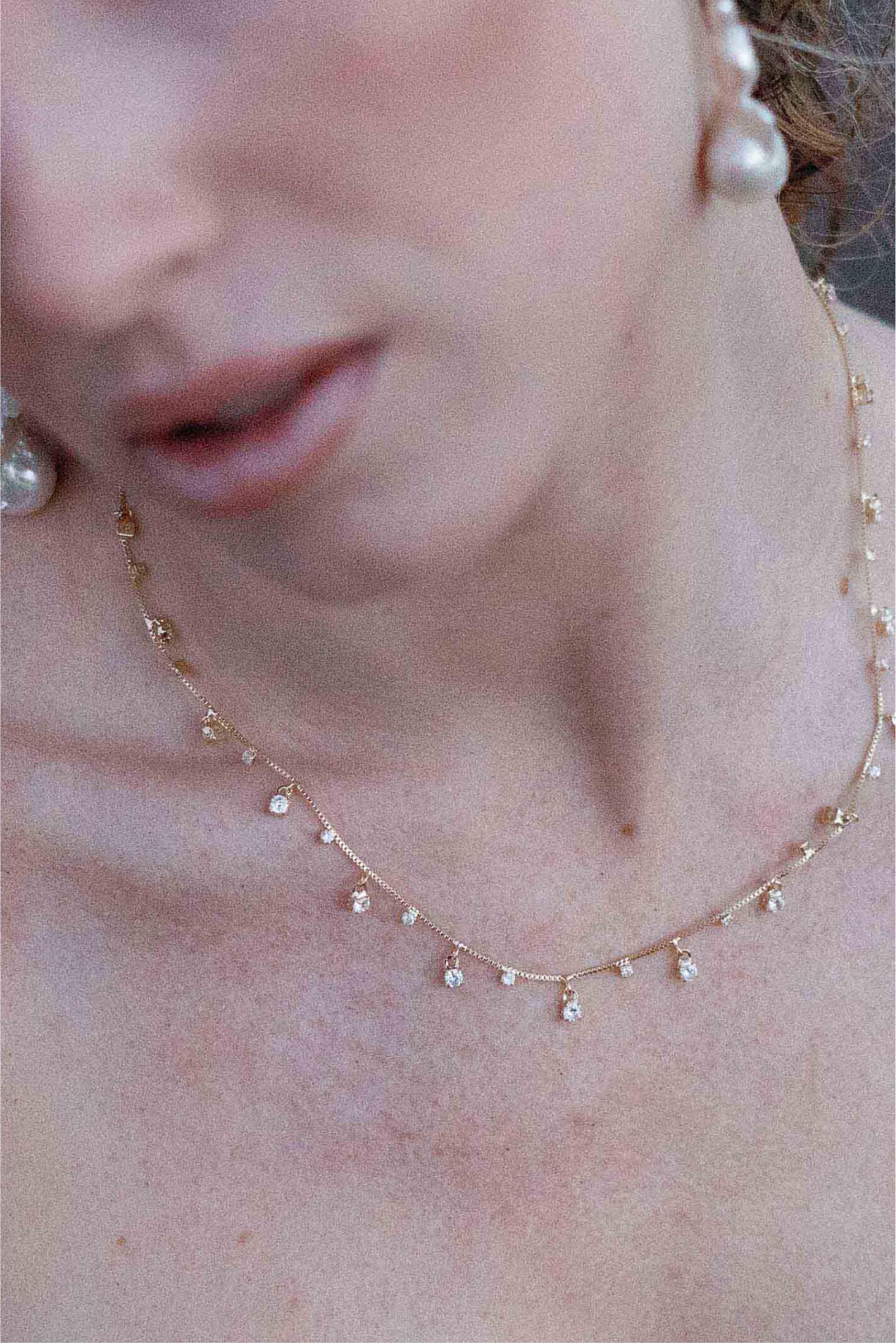 Gold-filled stardust necklace with crystal charms.