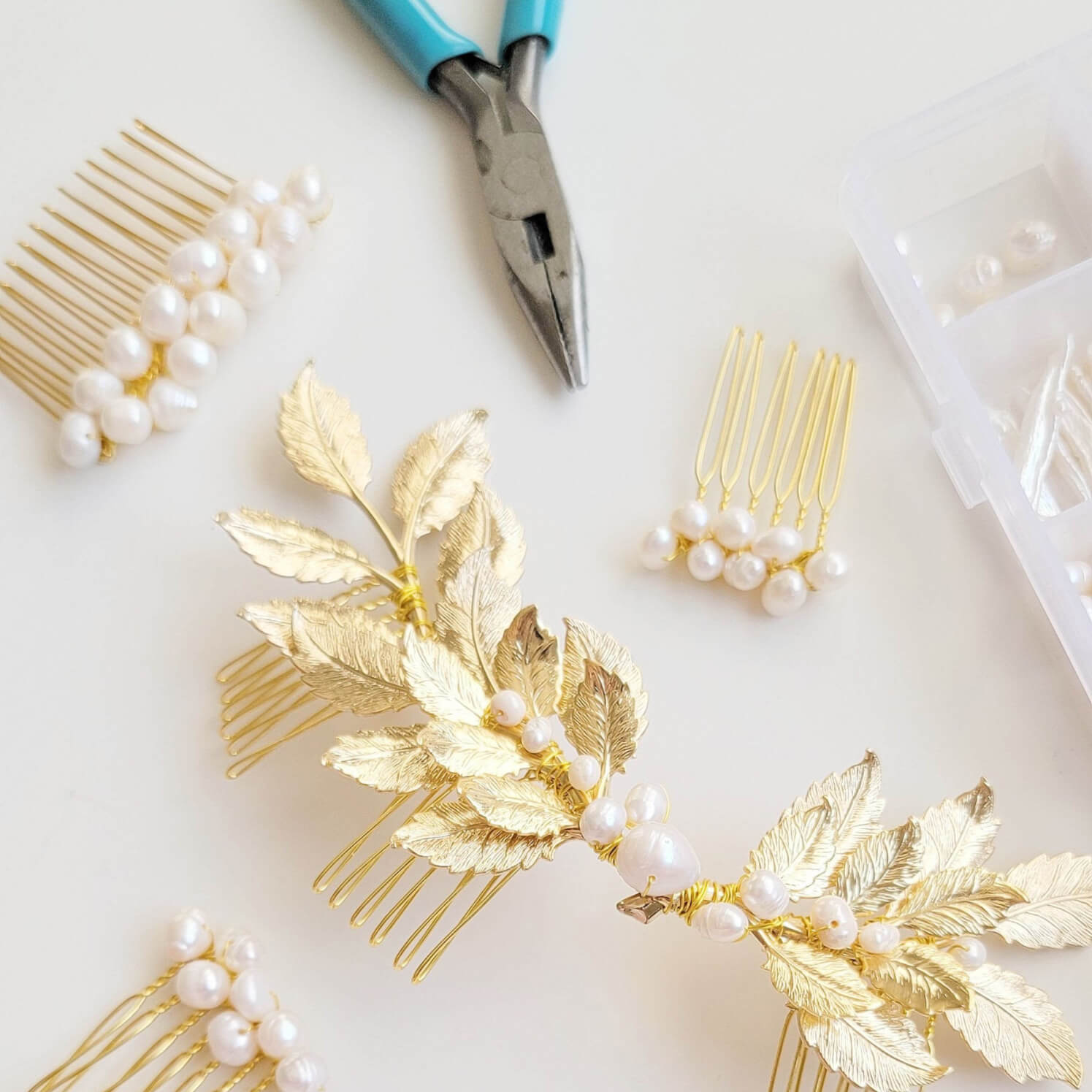 Jewelry pliers with bridal hair combs and freshwater pearls.