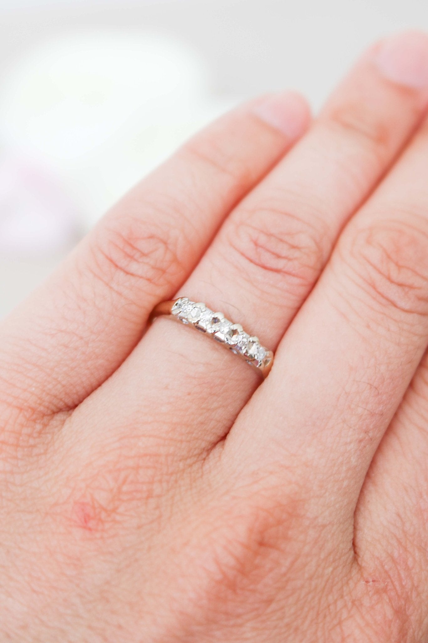 A 14ct Gold Diamond Vintage Engagement Ring/Wedding Band on a ring finger. Canadian vintage engagement rings. Vintage engagement rings Canada. Bridal jewelry Canada. Canadian jewelry brands. Affordable Canadian jewelry brands. Canadian bridal jewelry. Woman-owned Canadian jewelry brand. Antique Engagement Rings Canada. Wedding Canada.