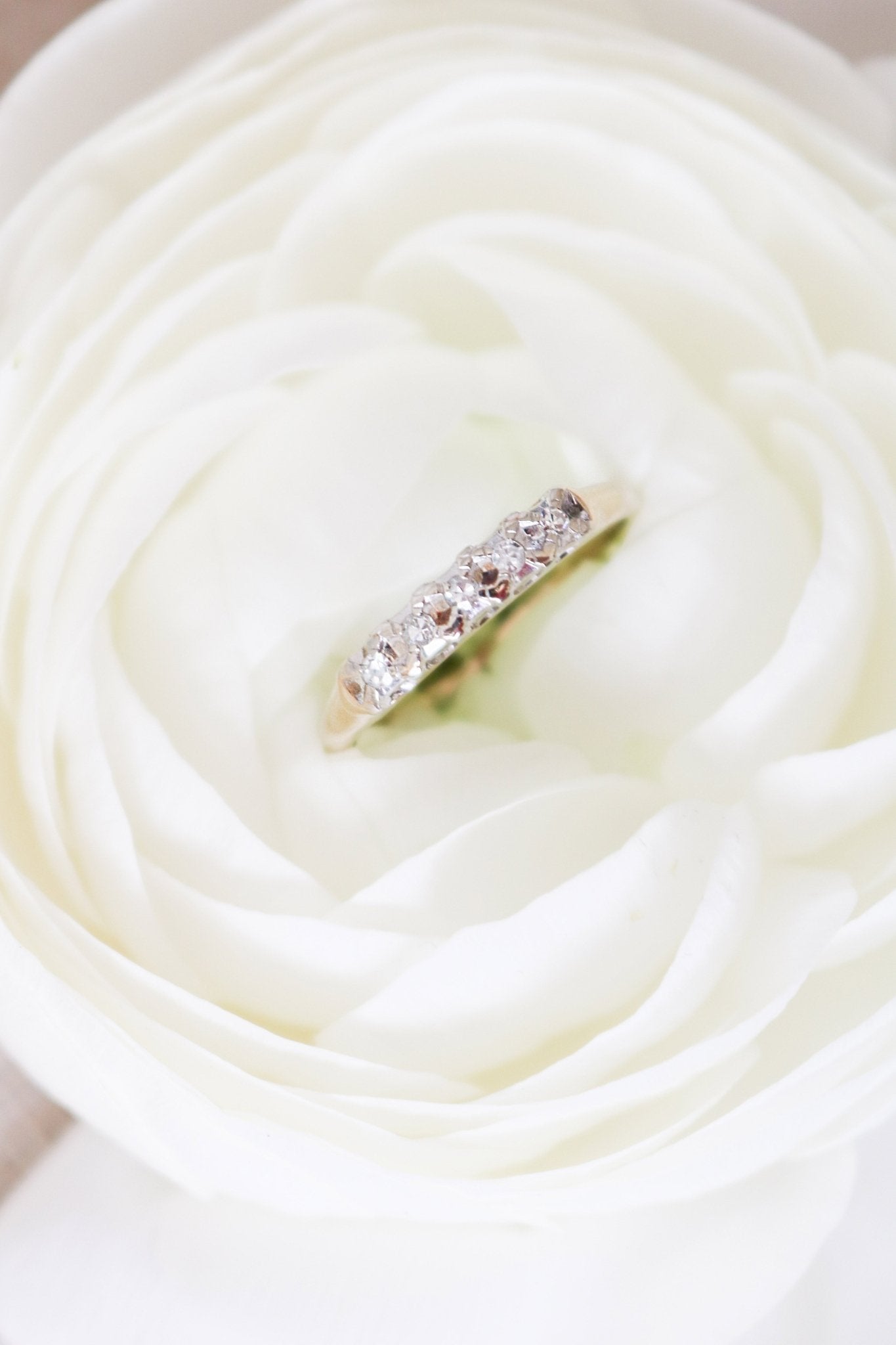 14ct Gold and Diamond Vintage Engagement Ring/Wedding Band sitting in a white rose. Canadian vintage engagement rings. Vintage engagement rings Canada. Bridal jewelry Canada. Canadian jewelry brands. Affordable Canadian jewelry brands. Canadian bridal jewelry. Woman-owned Canadian jewelry brand. Antique Engagement Rings Canada. Wedding Canada.