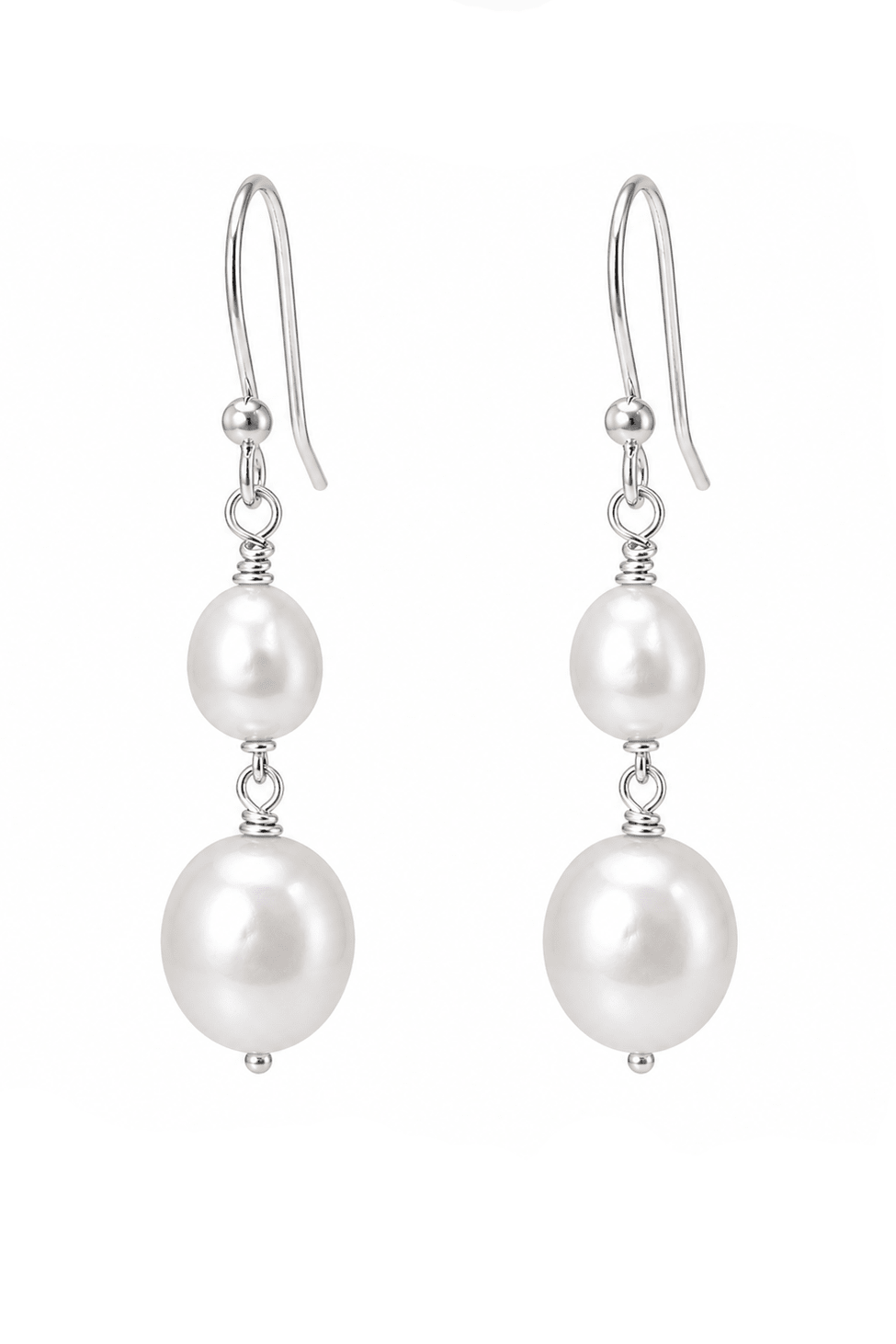 Pair of sterling silver fresh water pearl earrings handmade by Canadian BIPOC designer on a white background.
