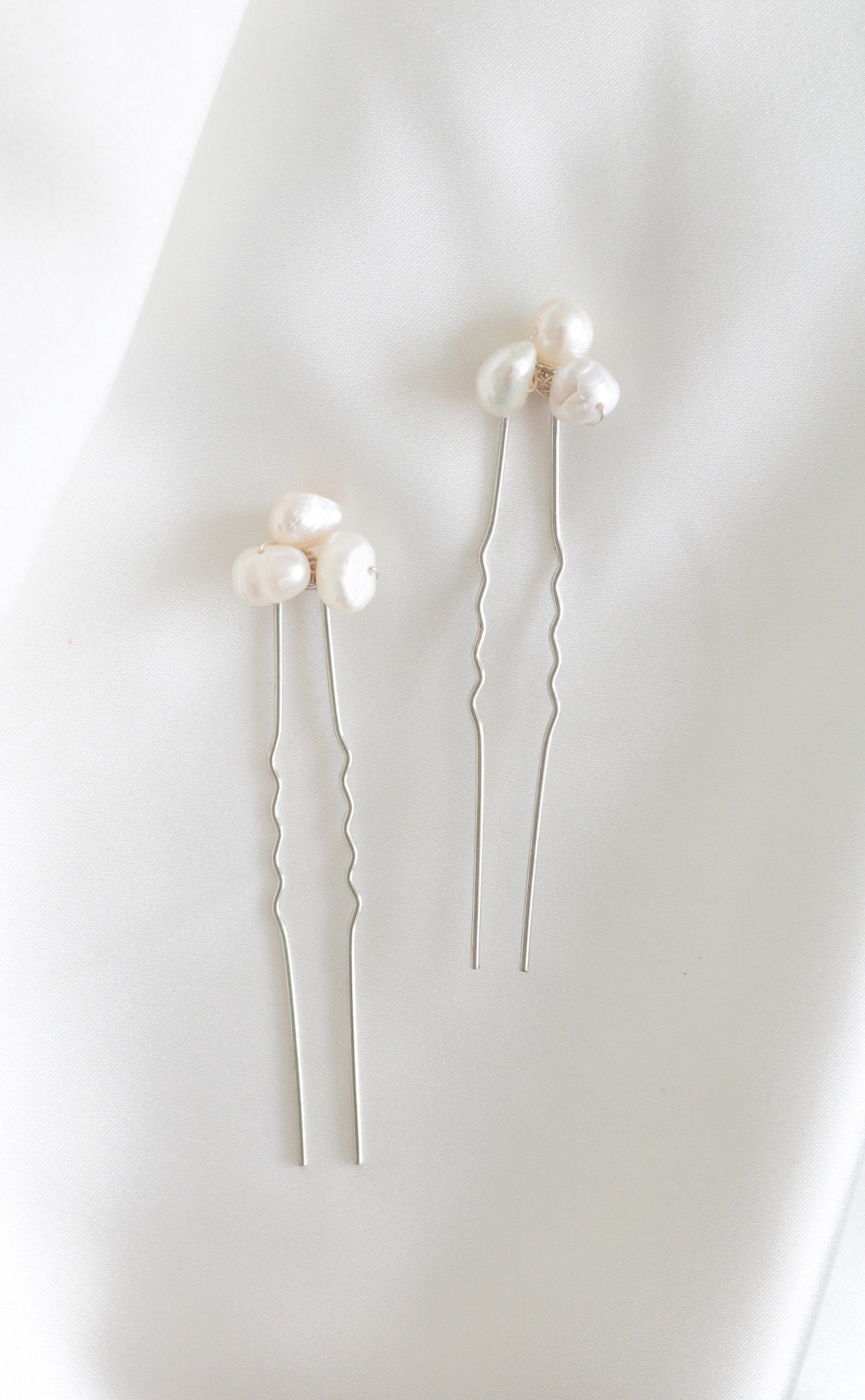 A set of two Silver Hayley Fresh Water Pearl Bridal Hairpins. Organic pearl accessories. Pearl Bridal Hair Accessories. Pearl Bridal Accessories. Bridal Hair Accessories. Bridal Accessories. Canadian Bridal Accessories. Handmade Canadian Accessories. Canadian handmade Accessories. Canadian weddings. Wedding Canada.