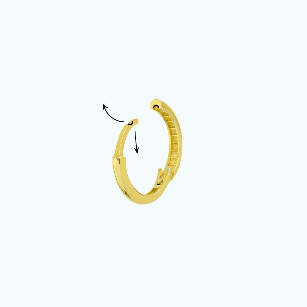 A diagram showing how to fix a gold filled huggie earring clasp on white background