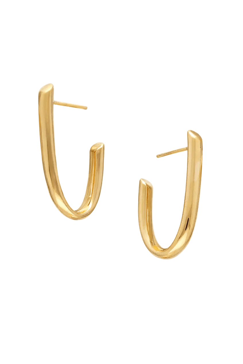 Gold J-shaped hoop earrings on a white background. Gold-filled Canadian jewelry. Affordable jewelry. Handmade Canadian jewelry. Statement Earrings. Everyday jewelry.