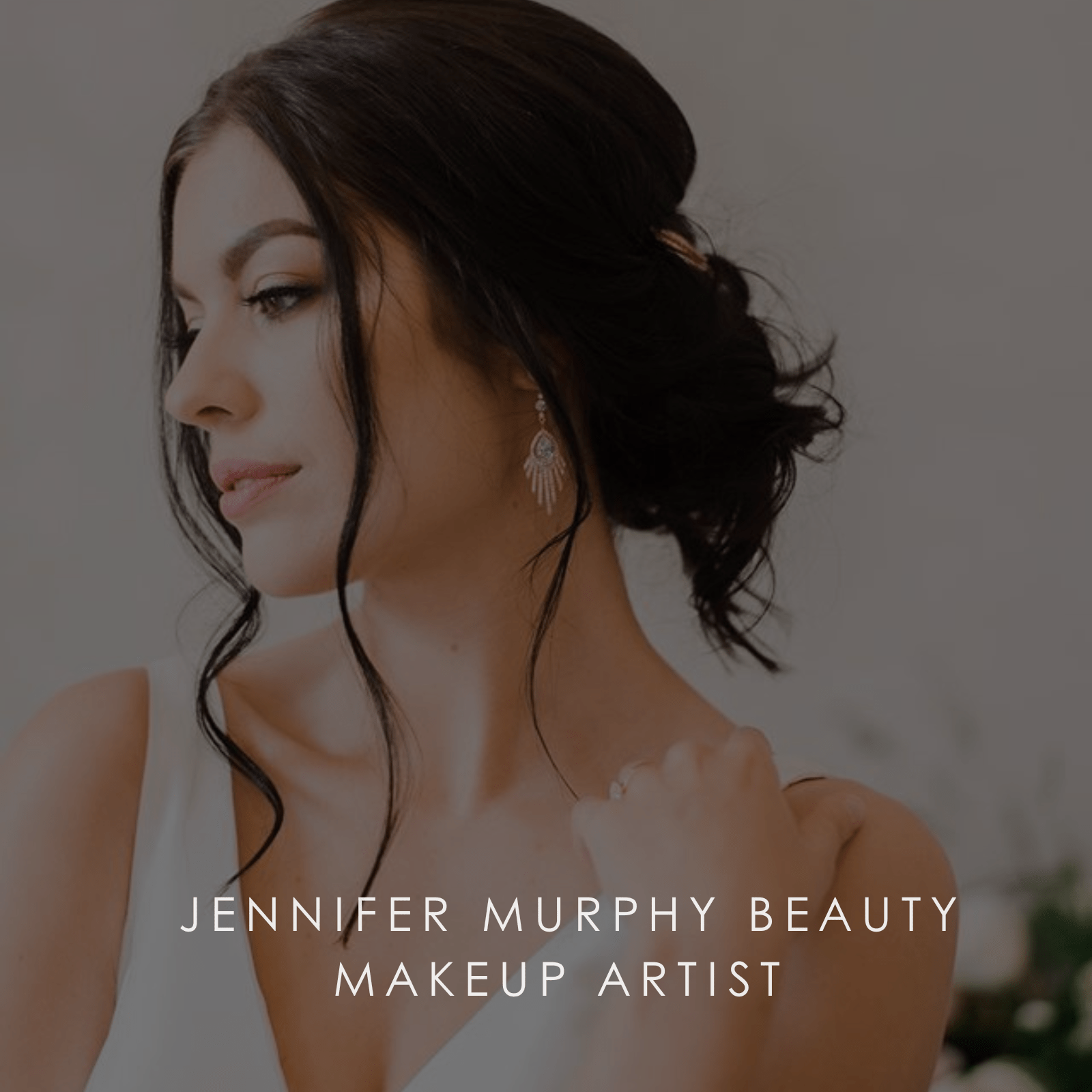 Side view of bridal makeup on brunette bride.