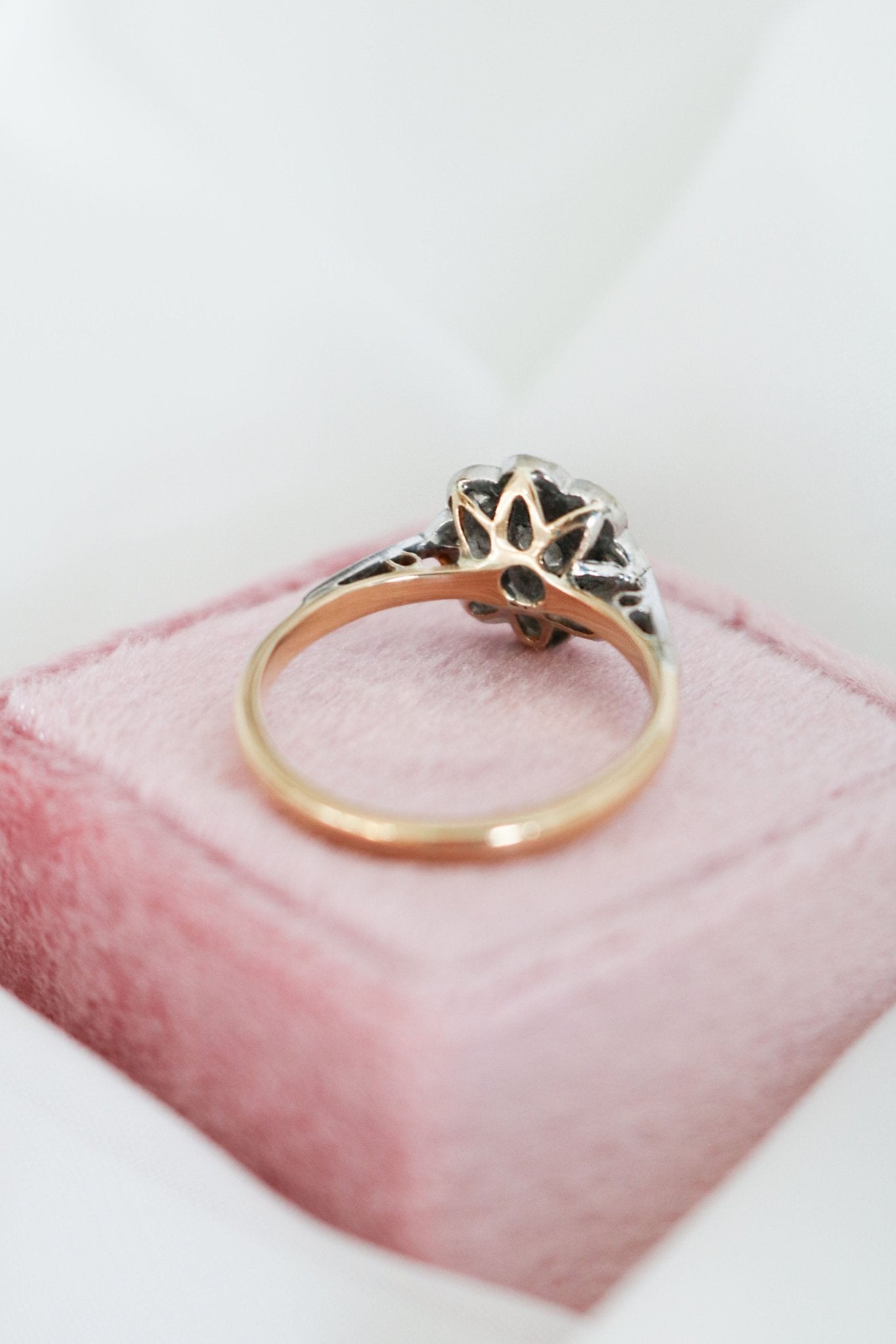 A close up of the back of the Lilibet Gold Diamond Vintage Engagement Ring on top of a ring box. Canadian vintage engagement rings. Bridal jewelry Canada. Vintage engagement rings Canada. Canadian weddings. Wedding Canada. Woman-owned Canadian jewelry brand. Canadian jewelry business. Small Canadian jewelry brands.