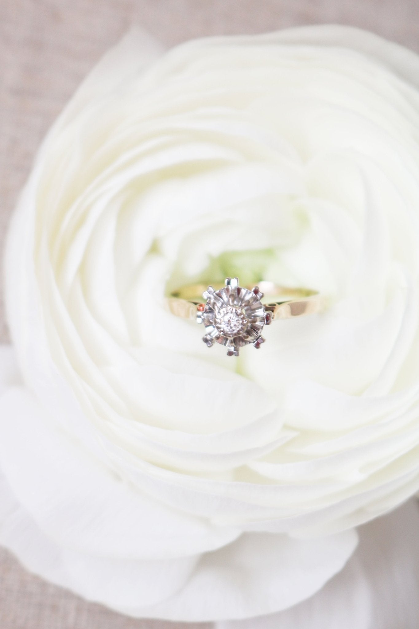 The Liona Floral Vintage Engagement Ring in 14ct Gold, Art Deco Style c.1920s nestled in a white rose. Antique Engagement Rings Canada. Canadian vintage engagement rings. Vintage engagement rings Canada. Bridal jewelry Canada.