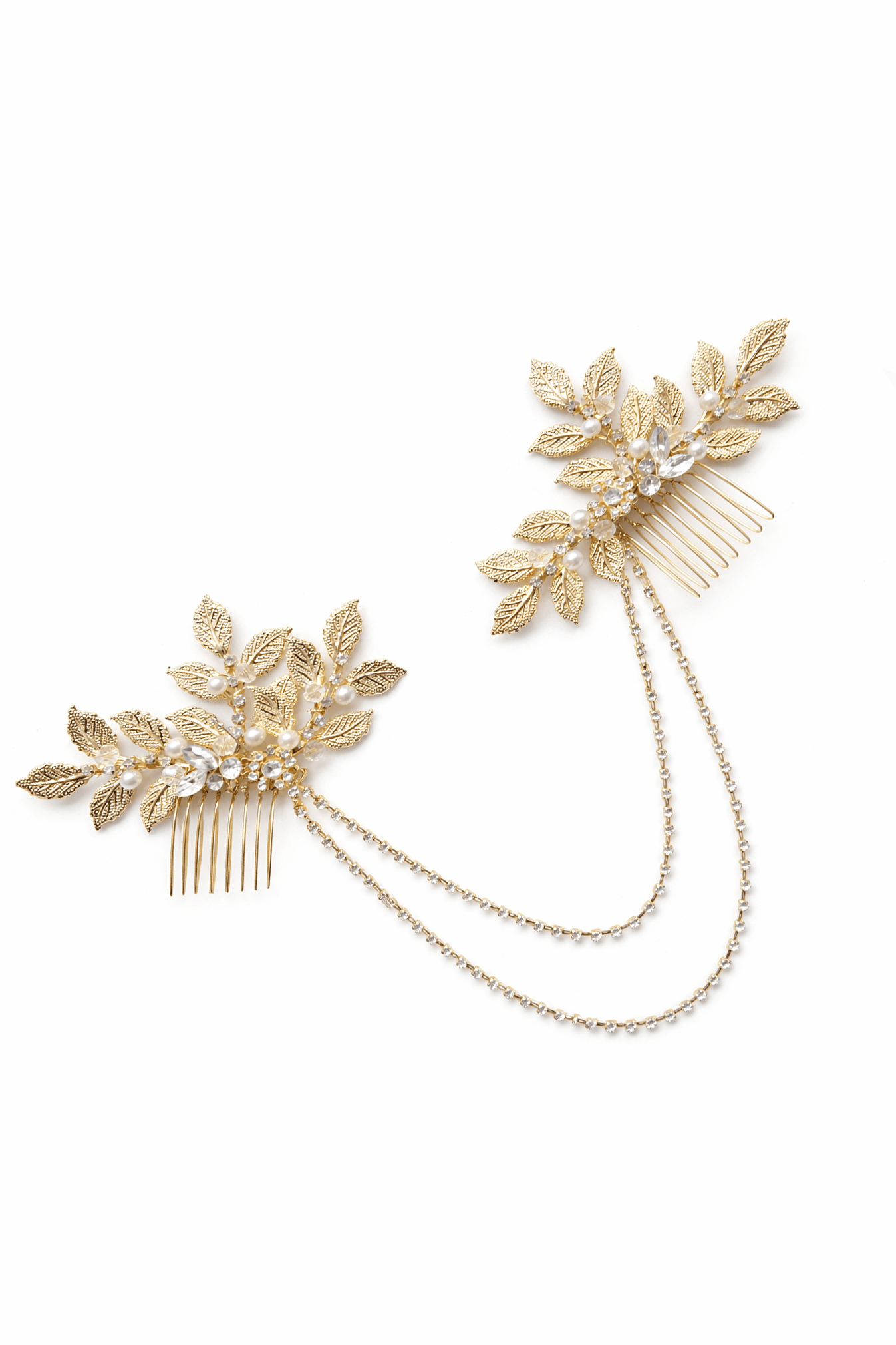 Gold bridal hair comb with leaf and pearl details on a white background. Handmade bridal accessories & bridal hair accessories by BIPOC bridal designer