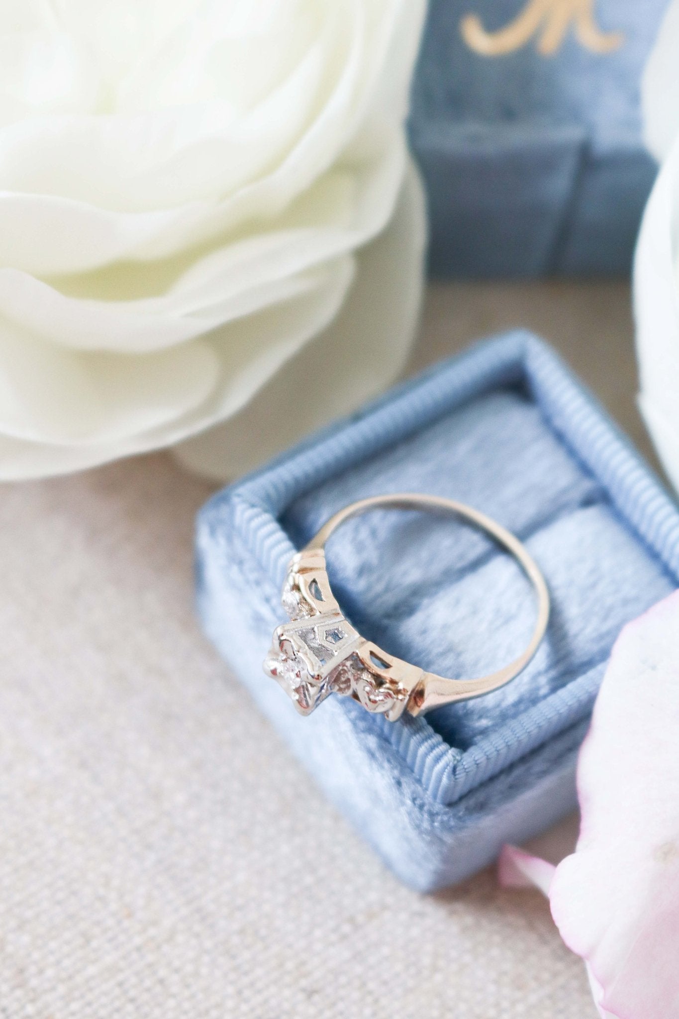 Top view of Yellow and White Gold Vintage Engagement Ring with Diamond Hearts on top of ring box. Antique Engagement Rings Canada. Canadian vintage engagement rings. Vintage engagement rings Canada. Bridal jewelry Canada. Canadian weddings. Wedding Canada. Canadian bridal jewelry. Woman-owned Canadian jewelry brand. Canadian jewelry business.