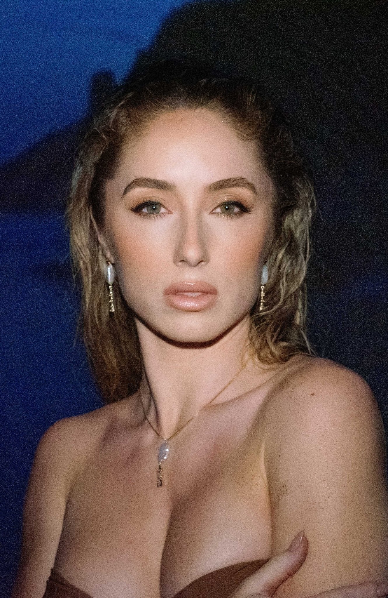 A sultry goddess holds the camera's gaze; adorned with the Nerida Gold-filled crystal and freshwater pearl earrings with matching necklace. Handmade jewelry Canada. Pearl jewelry Canada. Pearl Bridal jewelry Canada. Gold-filled jewelry Canada. Gold-filled Canadian jewelry. Bridal jewelry Canada. Statement Earrings. Statement Bridal Earrings. Organic pearl jewelry. Pearl jewelry sets.