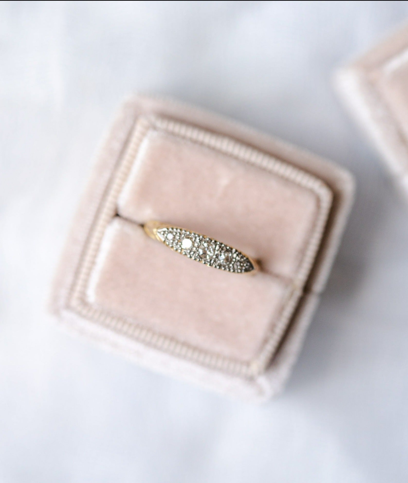 Top view of the Odette Art Nouveau 1900s Platinum and 18K Yellow Gold Diamond Vintage Engagement Ring. Antique Engagement Rings Canada. Canadian vintage engagement rings. Vintage engagement rings Canada. Bridal jewelry Canada. Canadian weddings. Wedding Canada. Canadian bridal jewelry. Woman-owned Canadian jewelry brand. Canadian jewelry business.
