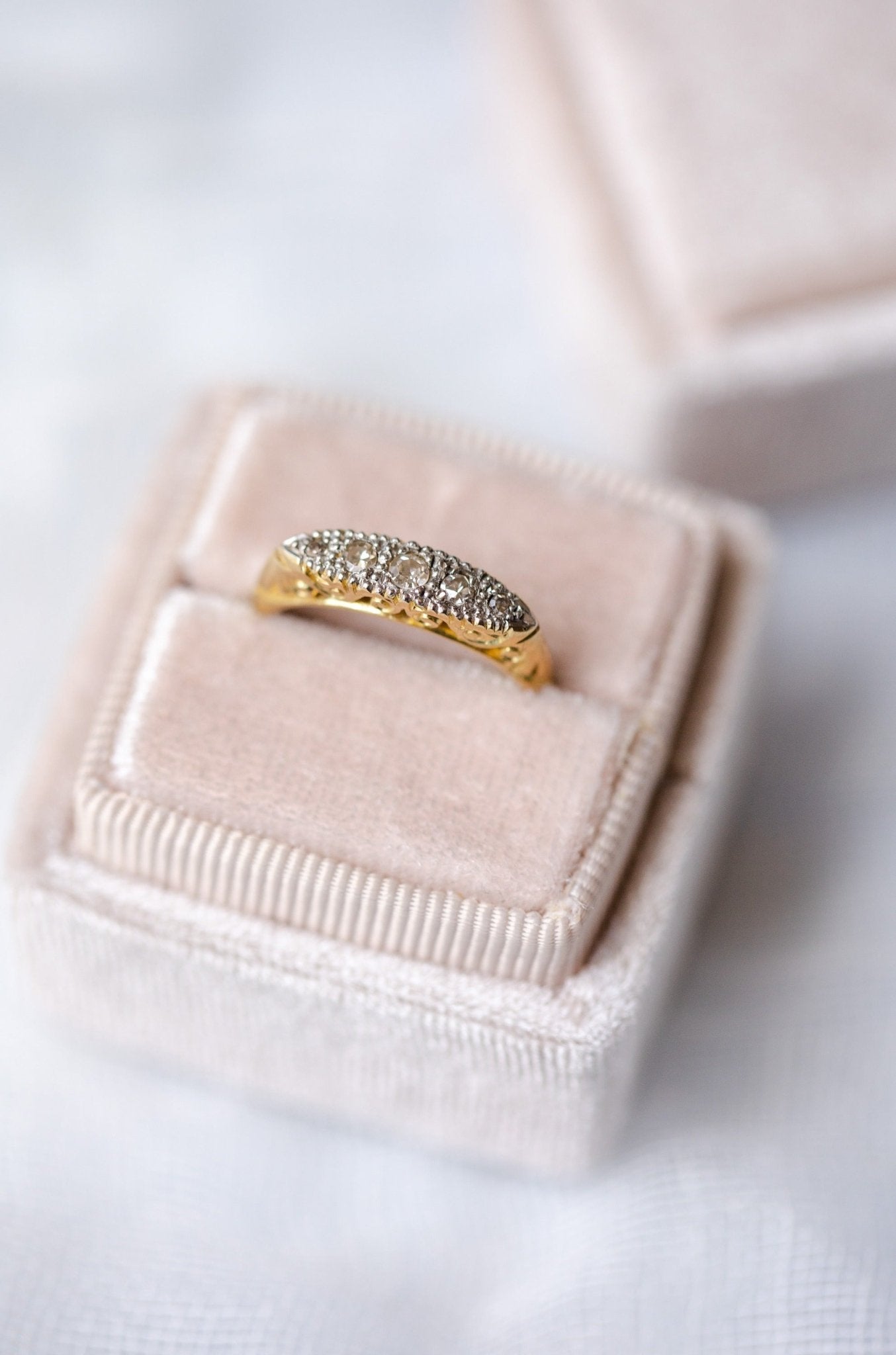 Partial top view of the Odette Art Nouveau 1900s Platinum and 18K Yellow Gold Diamond Vintage Engagement Ring. Antique Engagement Rings Canada. Canadian vintage engagement rings. Vintage engagement rings Canada. Bridal jewelry Canada. Canadian weddings. Wedding Canada. Canadian bridal jewelry. Woman-owned Canadian jewelry brand. Canadian jewelry business.