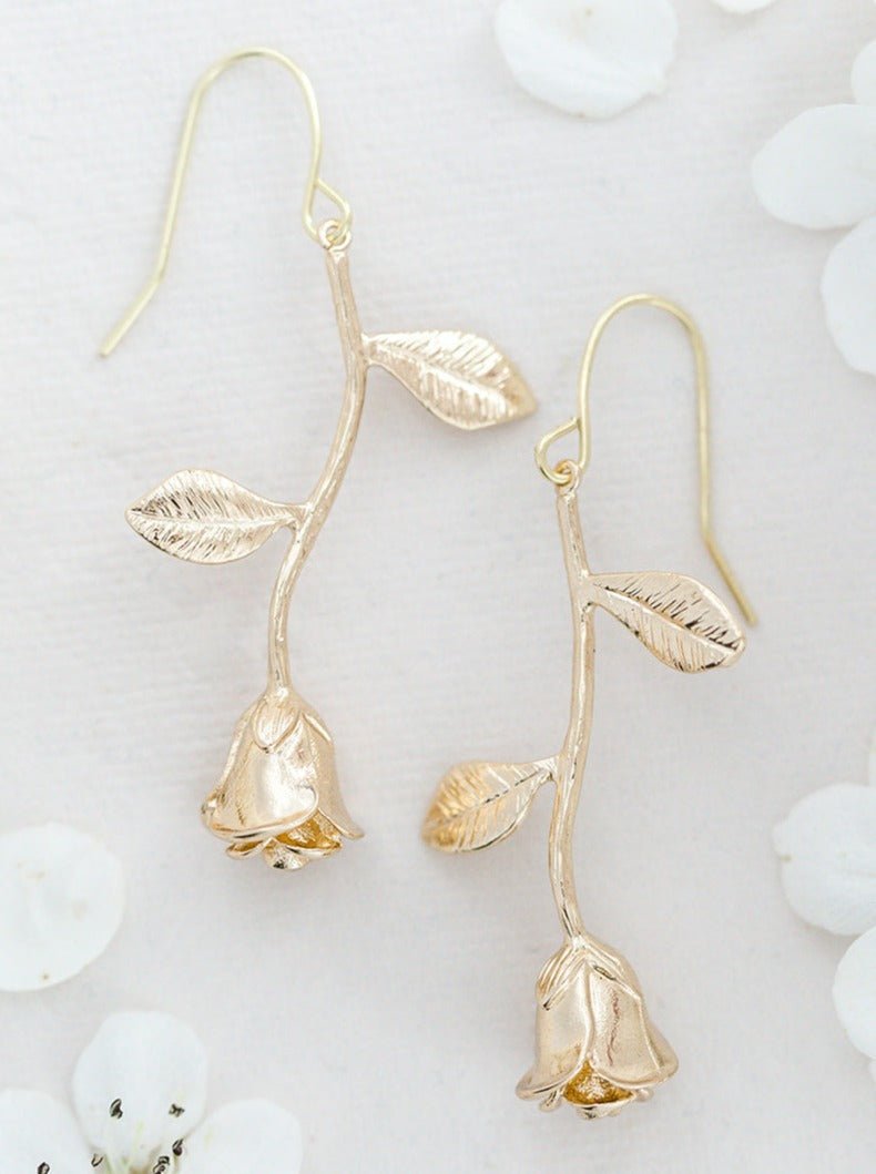 A pair of Orarose Golden Rose Earrings in 14k Gold-filled. Bridal jewelry Canada. Gold-filled jewelry Canada. Handmade Canadian jewelry. Woman-owned Canadian jewelry brand. Canadian jewelry business.