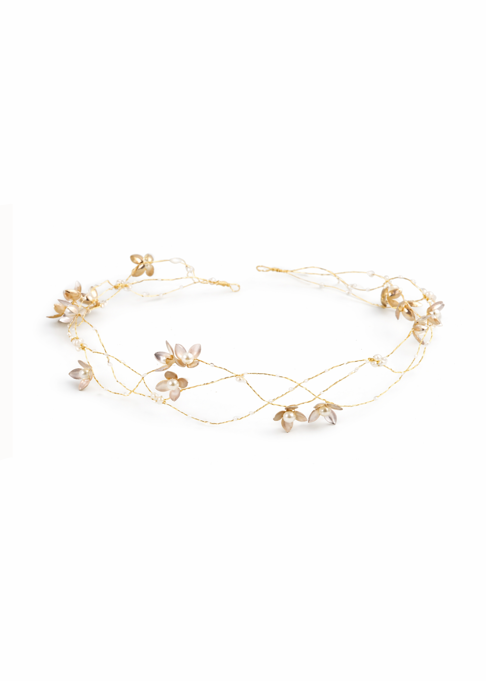 Gold Bridal Hairvine with floral elements and freshwater pearls on a white background. Bridal jewelry Canada. Canadian weddings. Canadian jewelry business. Bridal Hair Accessories. Pearl Bridal Accessories. Canadian bridal jewelry