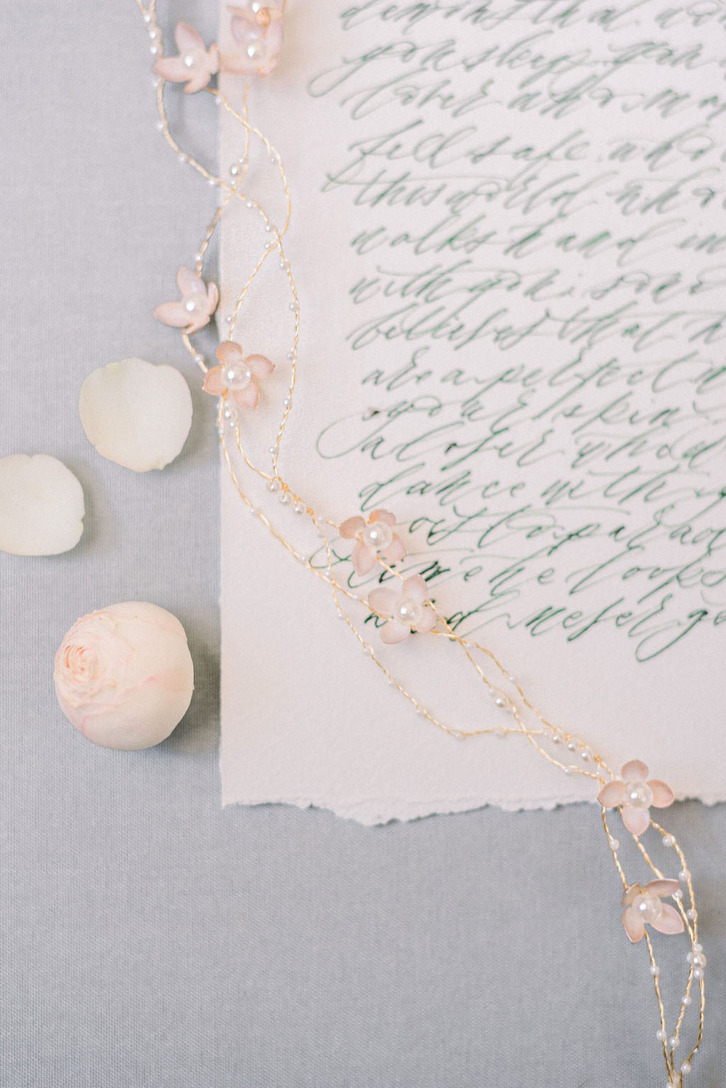 Decorative floral bridal hairvine with freshwater pearls on a piece of paper. Bridal jewelry Canada. Canadian weddings. Canadian jewelry business. Bridal Hair Accessories. Pearl Bridal Accessories. Canadian bridal jewelry