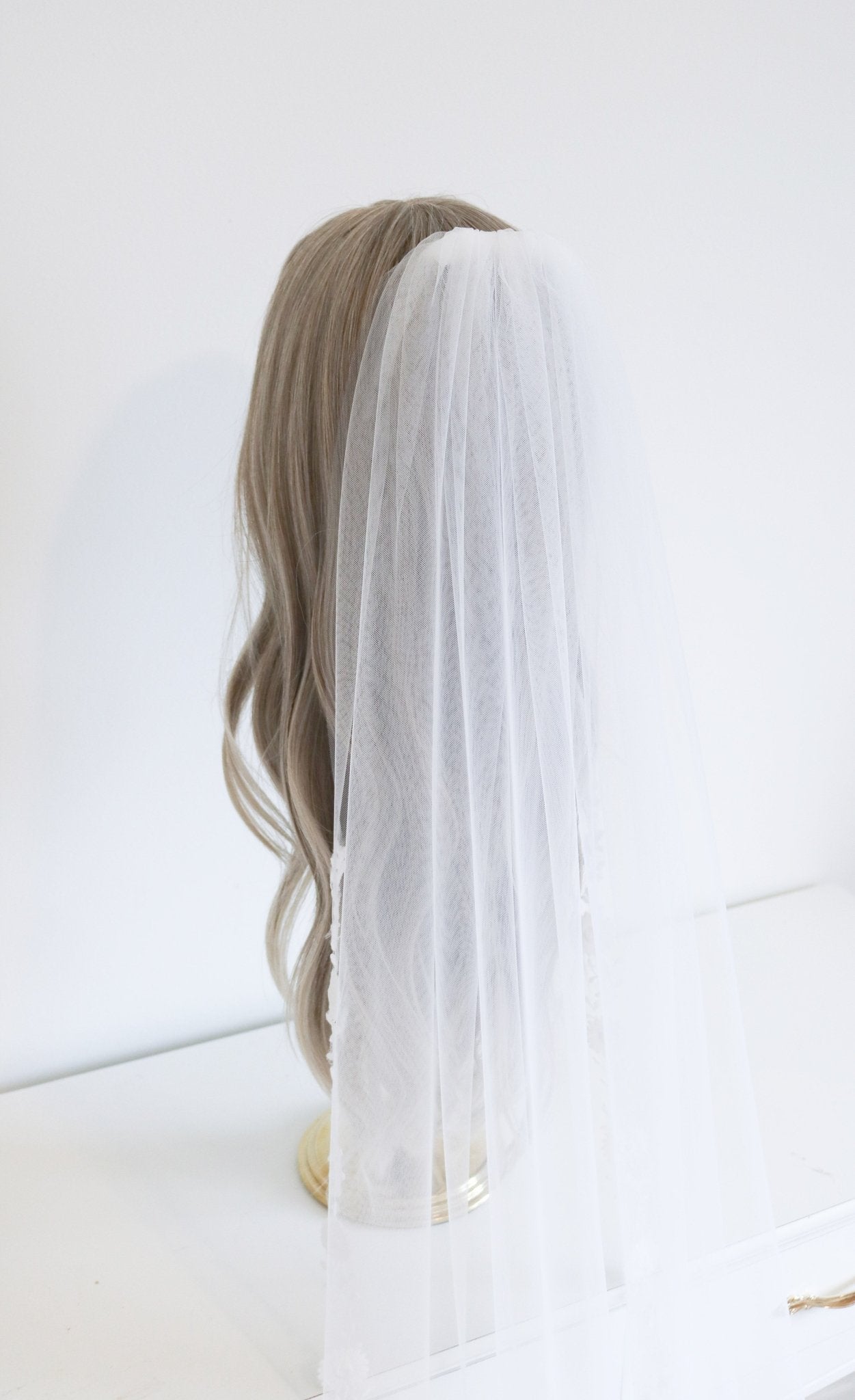 Back view of top of Sienna Floral Vine Wedding Veil on head bust. Canadian weddings. Wedding Canada. Wedding veils Canada. Bridal Hair Accessories. Bridal Accessories. Canadian Bridal Accessories. Handmade Canadian Accessories. Canadian handmade Accessories. Canadian designer. Canadian artist.