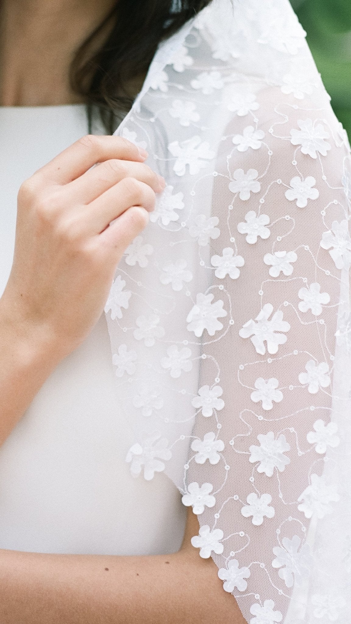 A close up of the lacey floral pattern on the Sonnet wedding veil. Canadian weddings. Wedding Canada. Wedding veils Canada. Bridal Hair Accessories. Bridal Accessories. Canadian Bridal Accessories. Handmade Canadian Accessories. Canadian handmade Accessories. Canadian designer. Canadian artist.