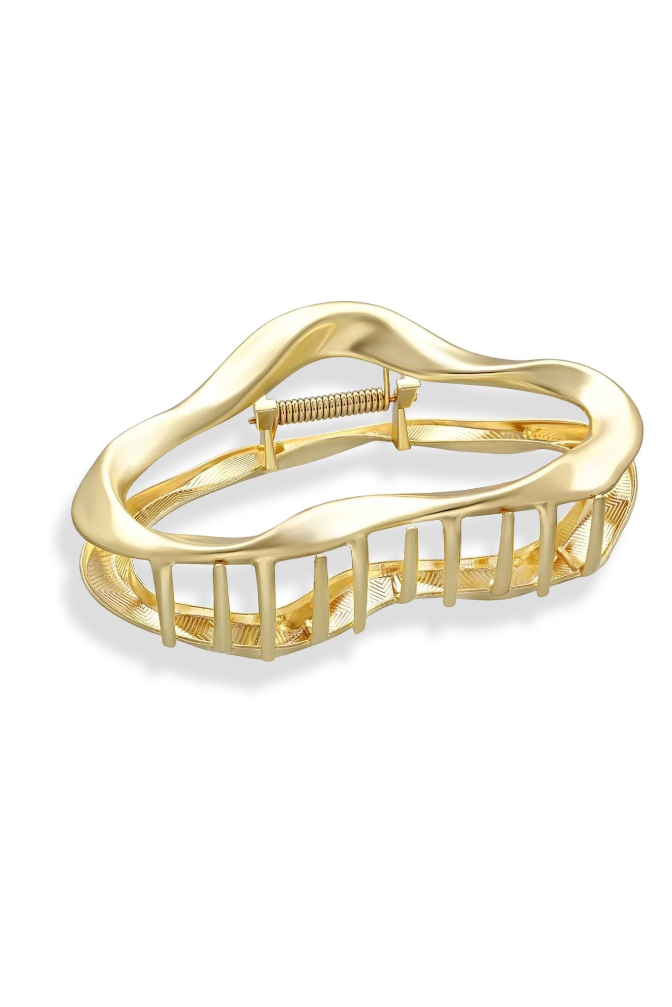 Gold hair clip on a white background. Everyday hair accessories. Hair accessories Canada. Canadian jewelry brands.