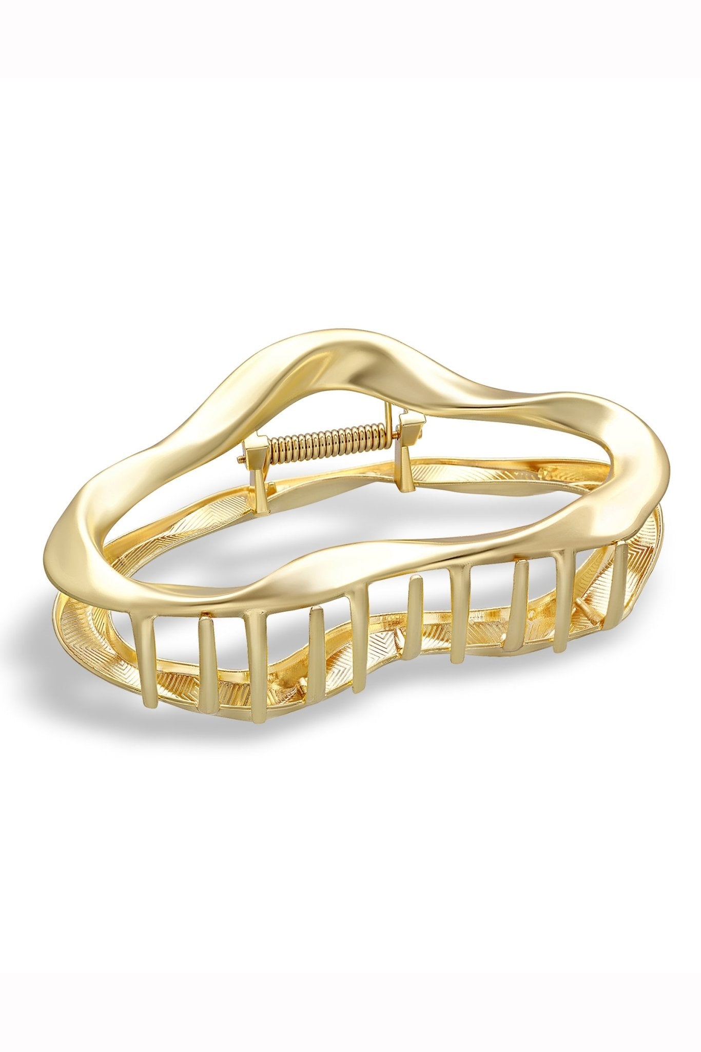 Gold hair clip on a white background. Everyday hair accessories. Hair accessories Canada. Canadian jewelry brands.