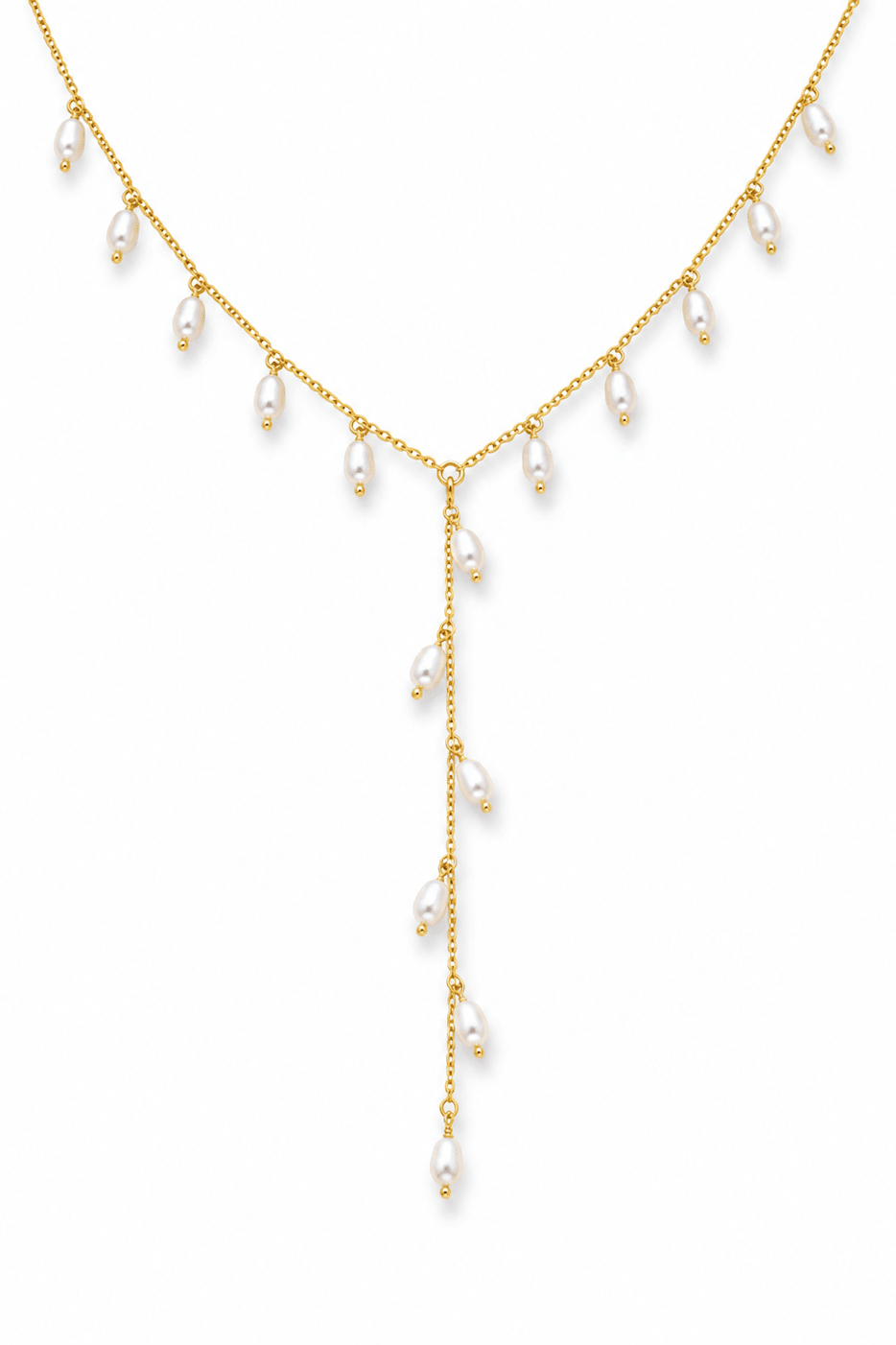 Gold lariat style necklace with fresh water pearl drops on a white background. Handmade pearl jewelry by Canadian jewellery designer