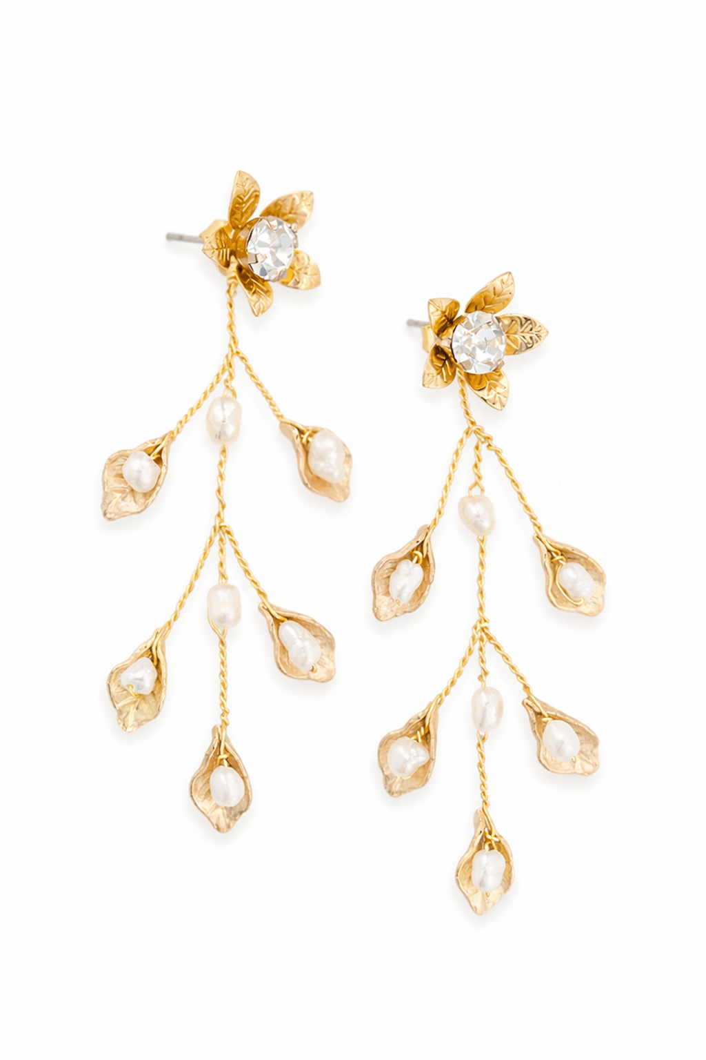 Gold leaf statement earrings with crystals, flowers, and pearls on a white background.
