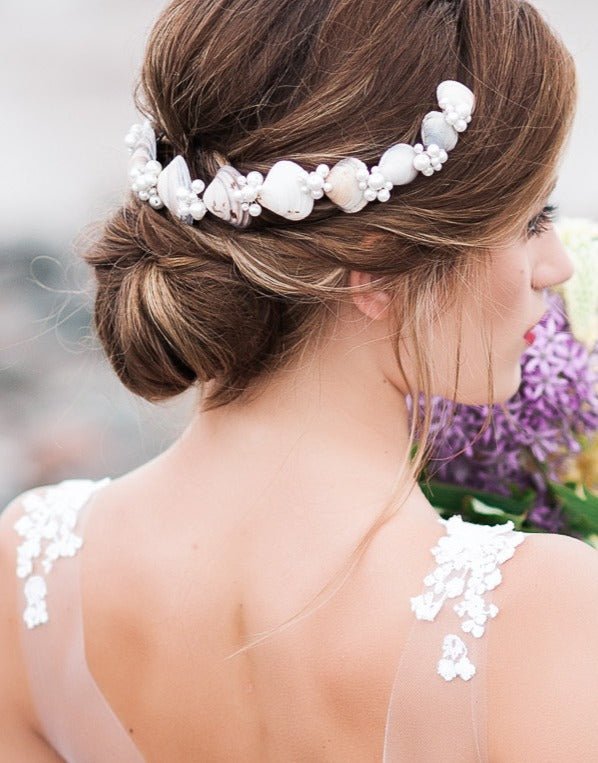 Ocean shells and freshwater pearls adorn this bridal wreath, giving any wedding a seaside flare. 